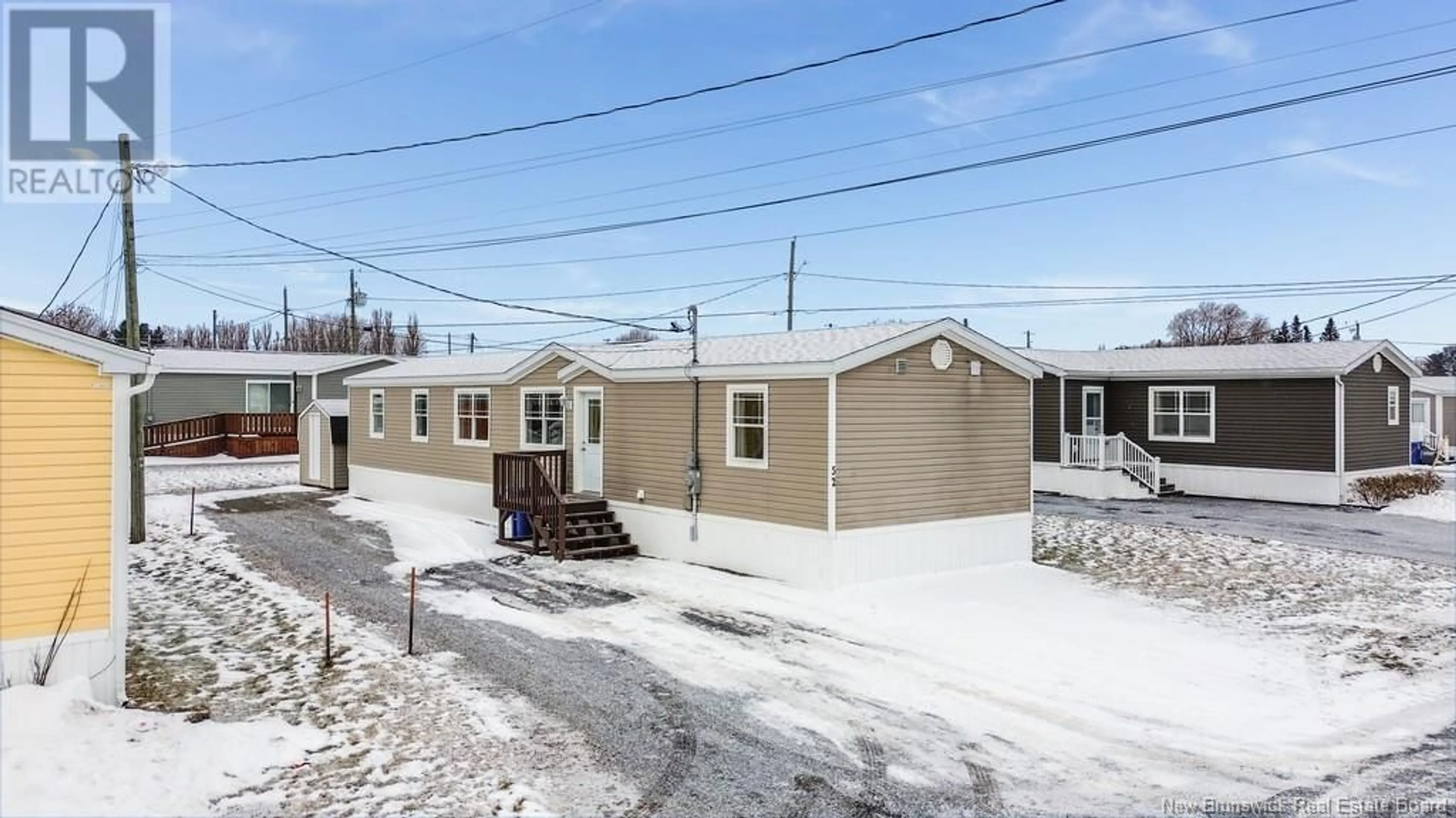 Home with vinyl exterior material, street for 52 Carr Lane, Jacksonville New Brunswick E7M0G2