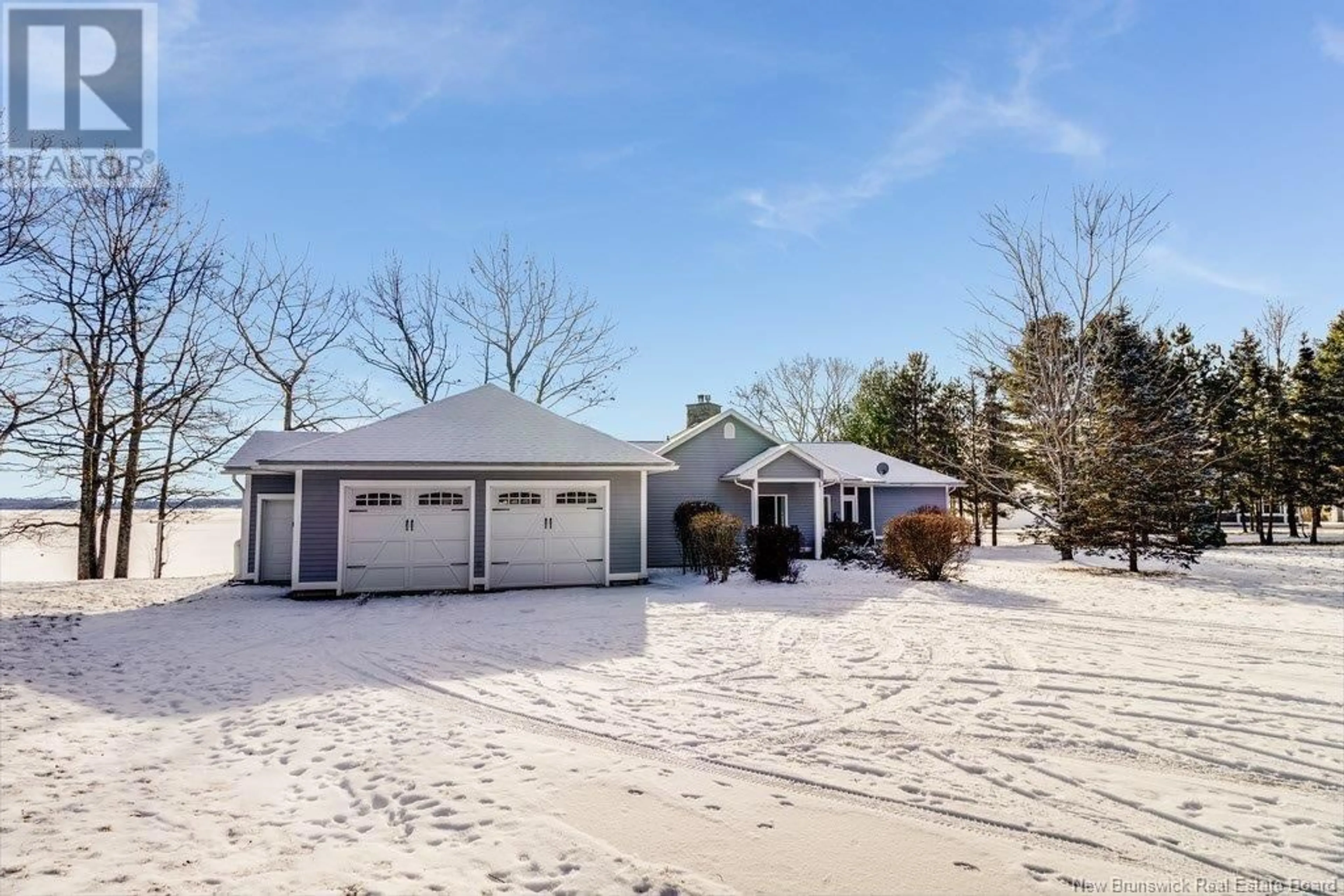 A pic from outside/outdoor area/front of a property/back of a property/a pic from drone, water/lake/river/ocean view for 18 COTTAGE LANE, Grand Lake New Brunswick E4B0B5