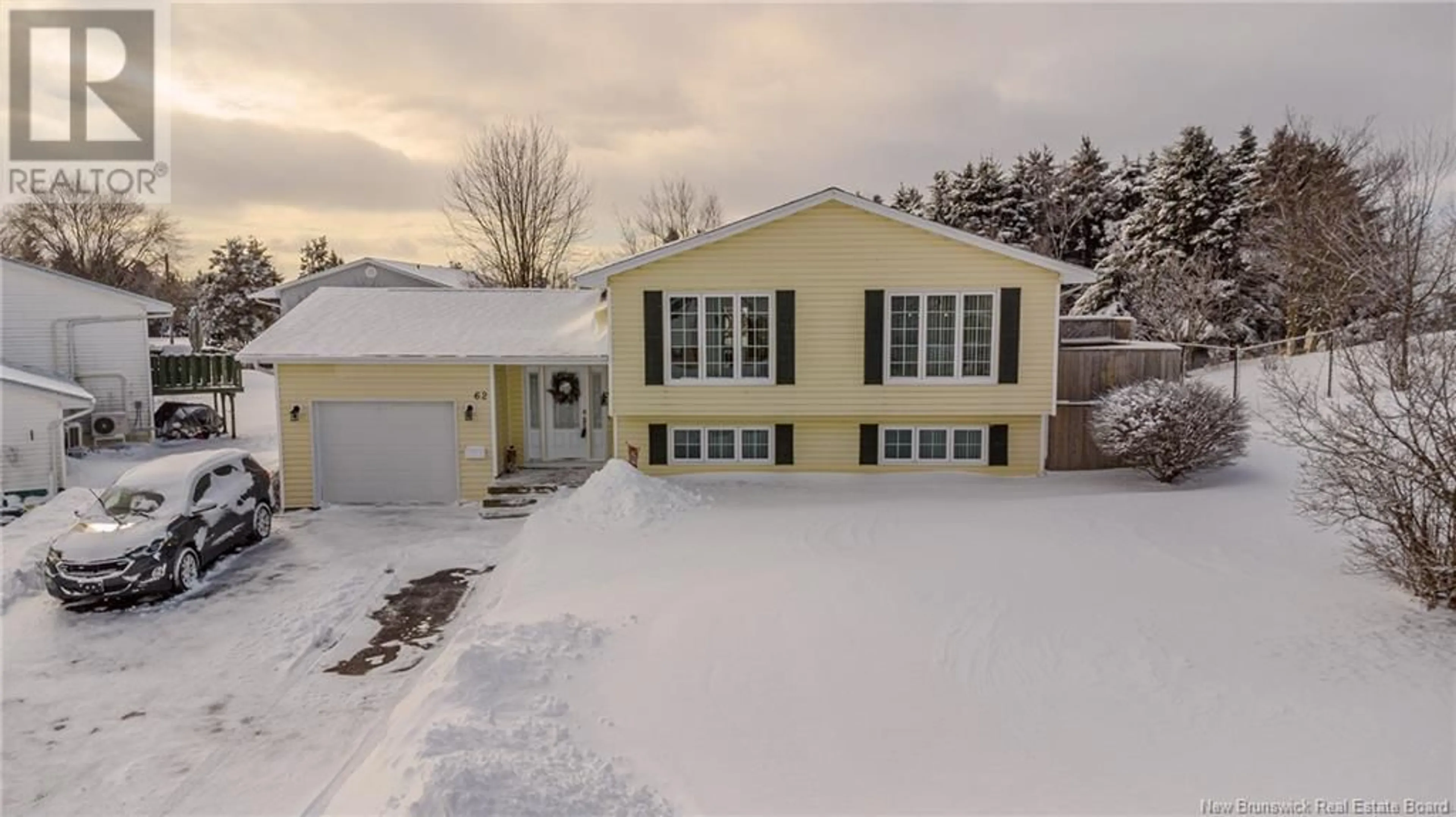 A pic from outside/outdoor area/front of a property/back of a property/a pic from drone, street for 62 Vista Ridge Crescent, Saint John New Brunswick E2J5A7