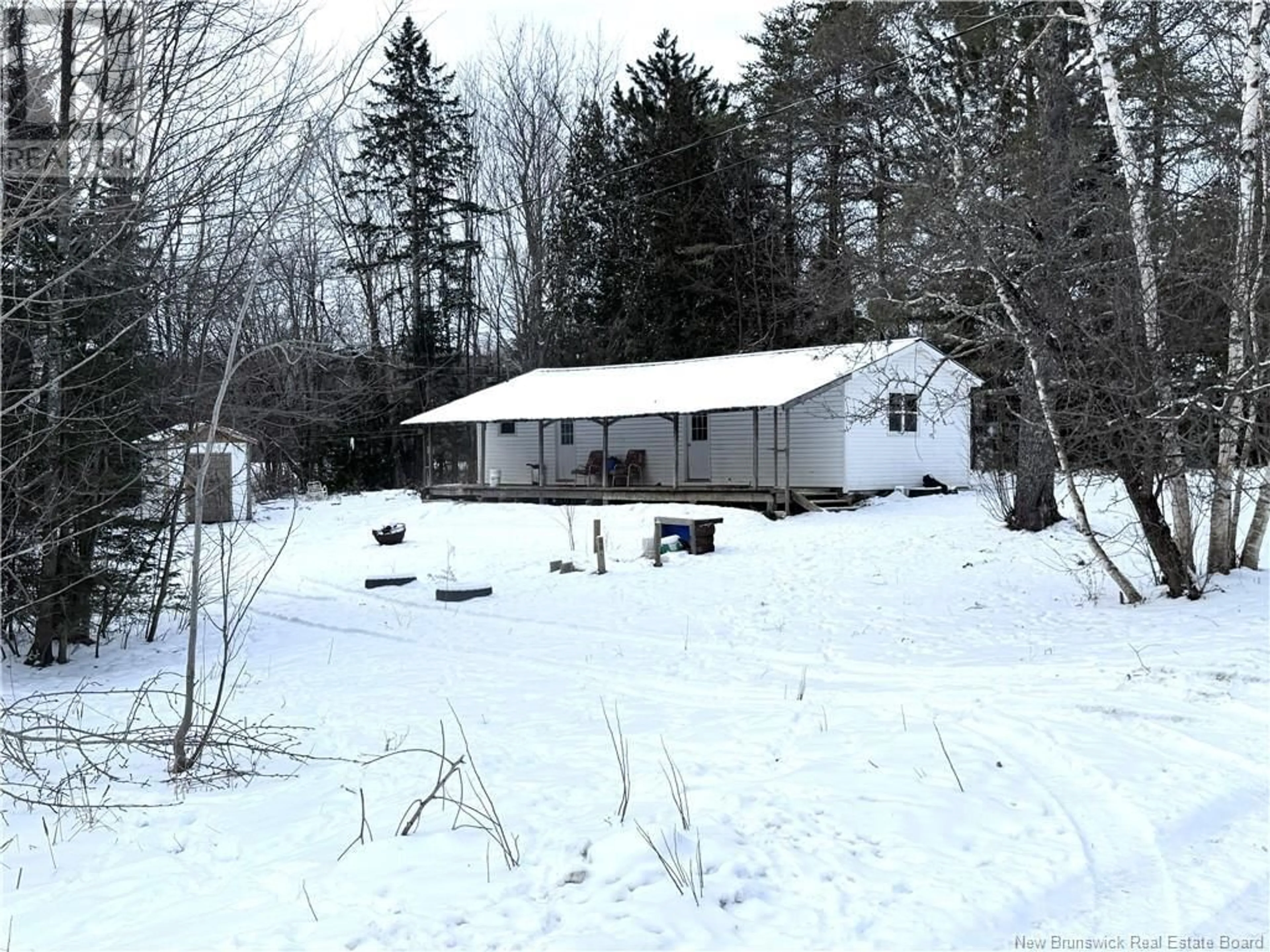 A pic from outside/outdoor area/front of a property/back of a property/a pic from drone, unknown for 11 Wright Road, Debec New Brunswick E7N3B4