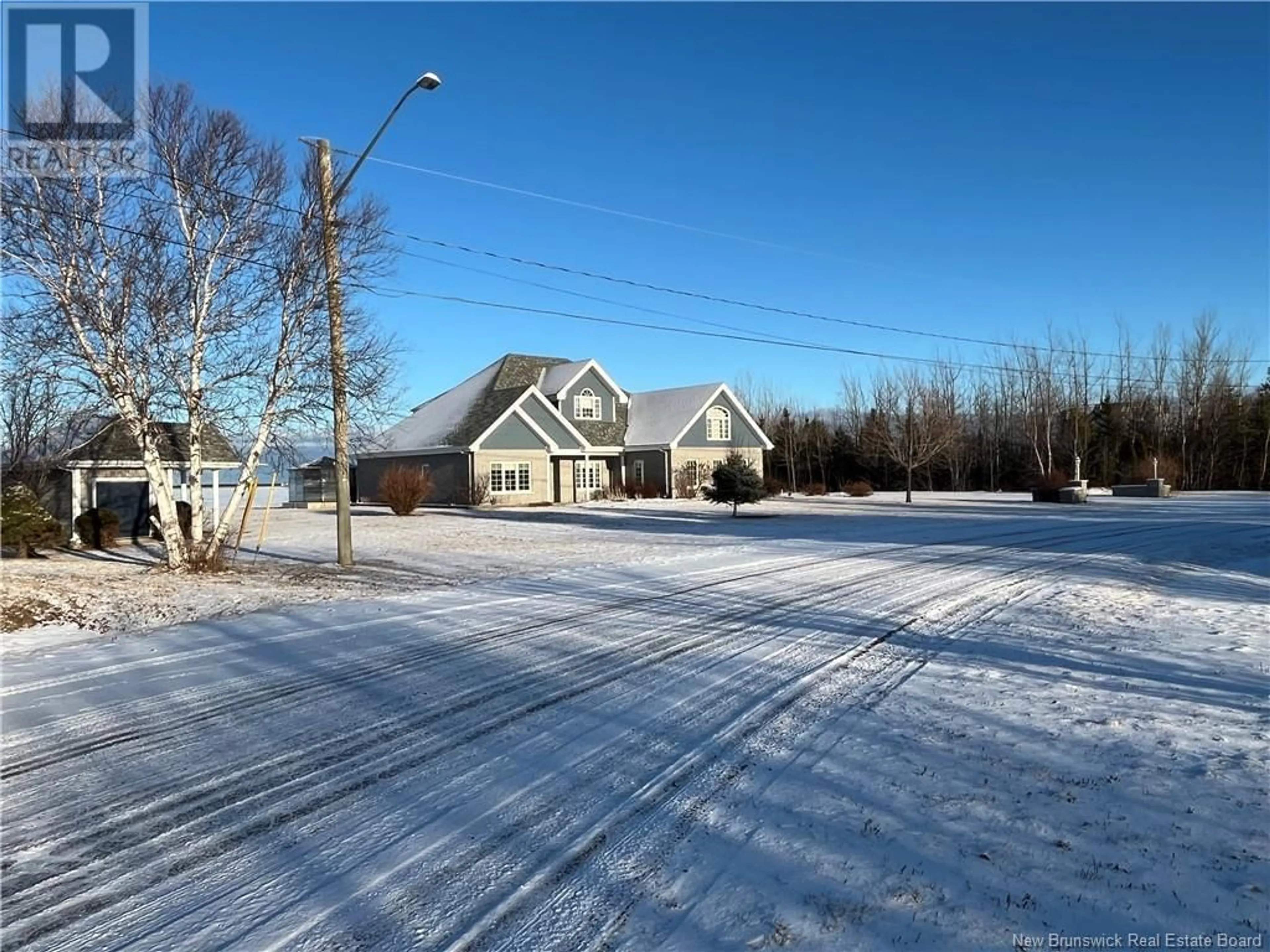 A pic from outside/outdoor area/front of a property/back of a property/a pic from drone, street for 521 STELLA MARIS, Tracadie New Brunswick E1X1C6