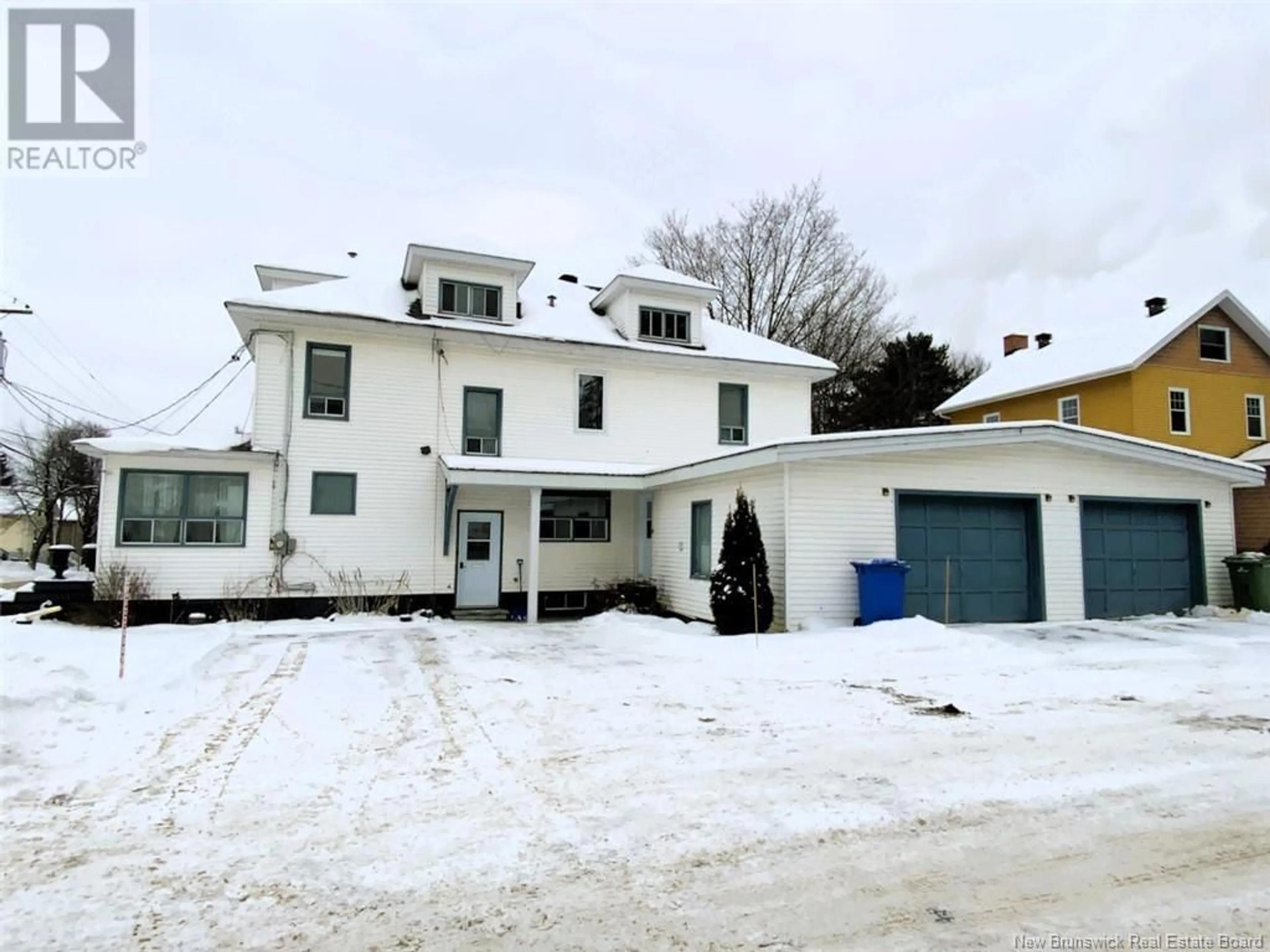 A pic from outside/outdoor area/front of a property/back of a property/a pic from drone, building for 65 Fraser Avenue, Edmundston New Brunswick E3V2B6