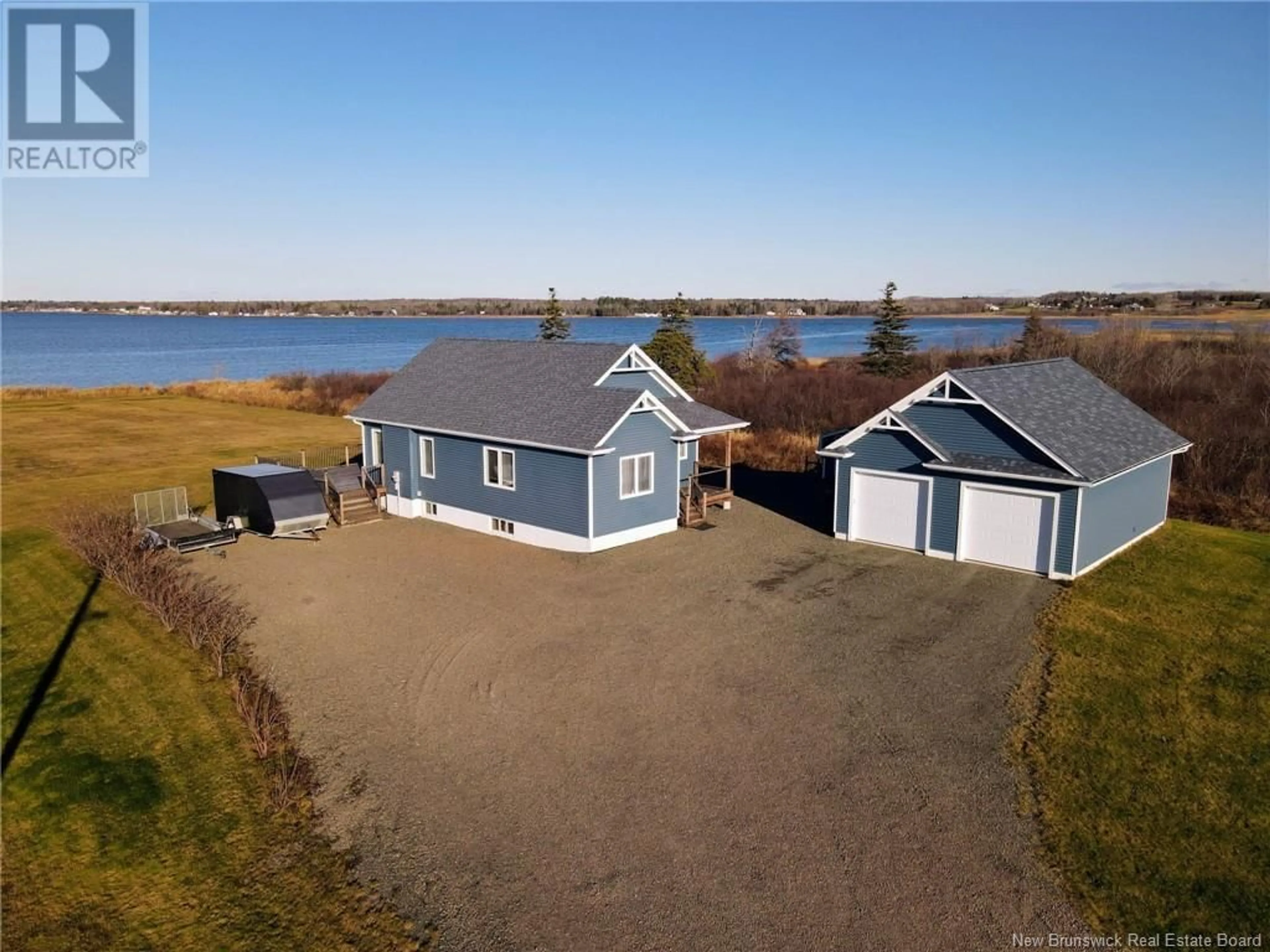 A pic from outside/outdoor area/front of a property/back of a property/a pic from drone, water/lake/river/ocean view for 144 BELLE-COTE, Grande-Digue New Brunswick E4R1X3