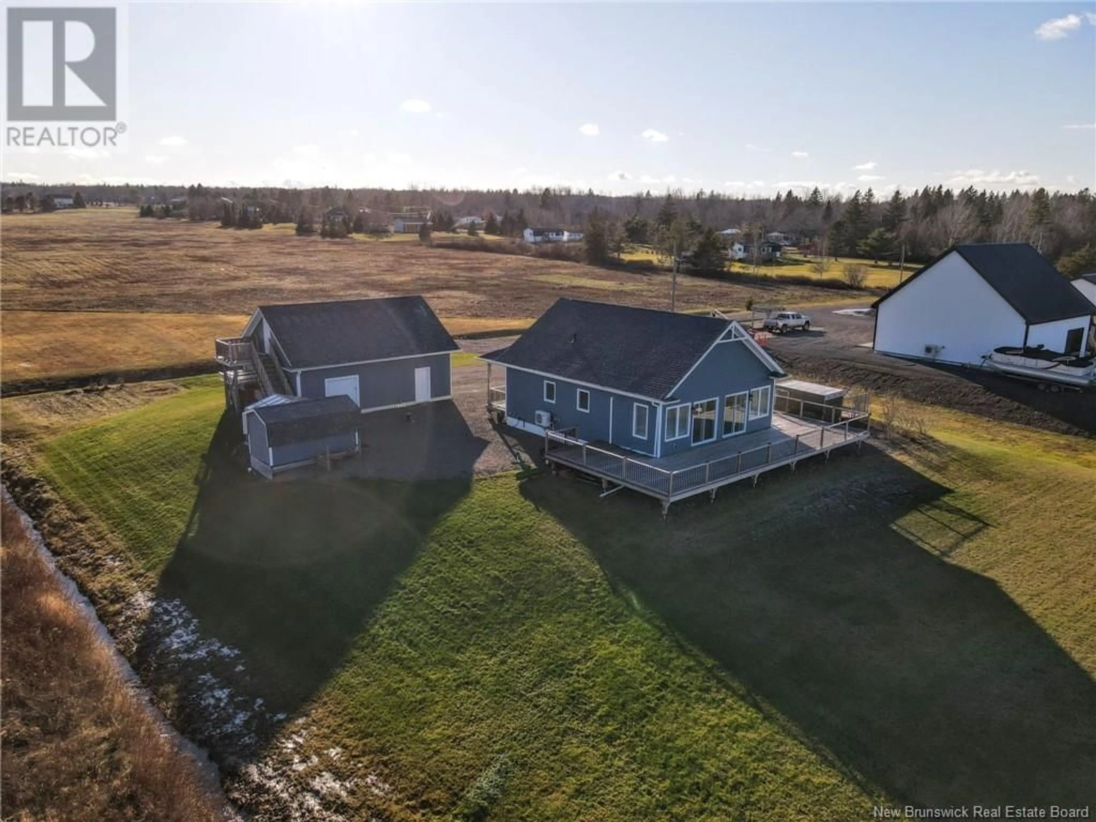 A pic from outside/outdoor area/front of a property/back of a property/a pic from drone, water/lake/river/ocean view for 144 BELLE-COTE, Grande-Digue New Brunswick E4R1X3