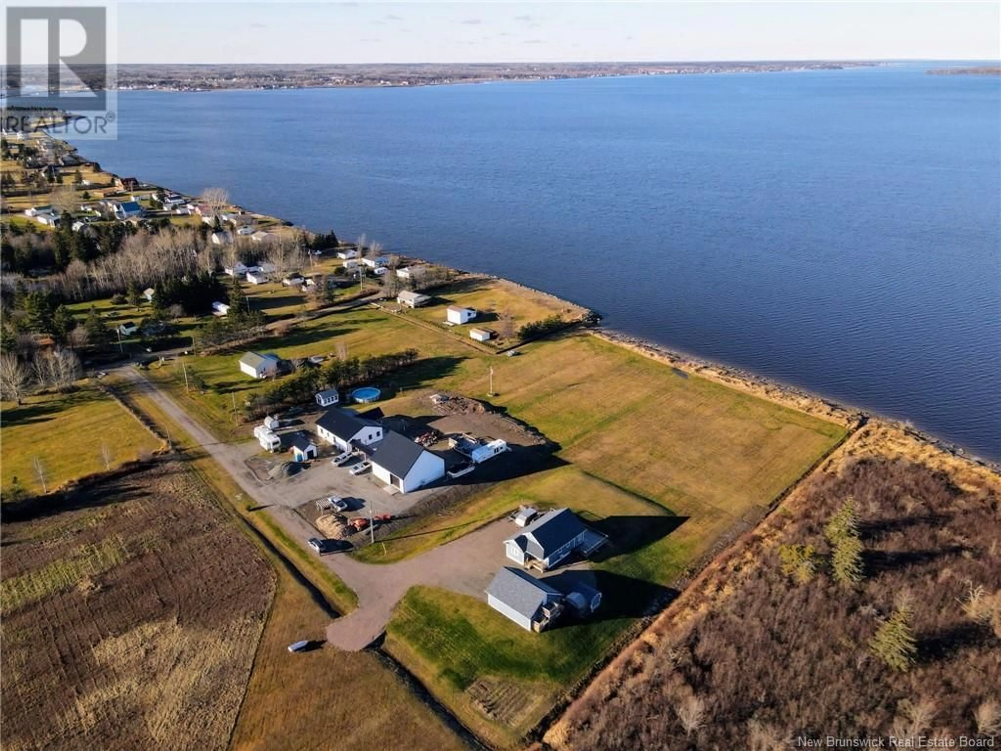 A pic from outside/outdoor area/front of a property/back of a property/a pic from drone, water/lake/river/ocean view for 144 BELLE-COTE, Grande-Digue New Brunswick E4R1X3