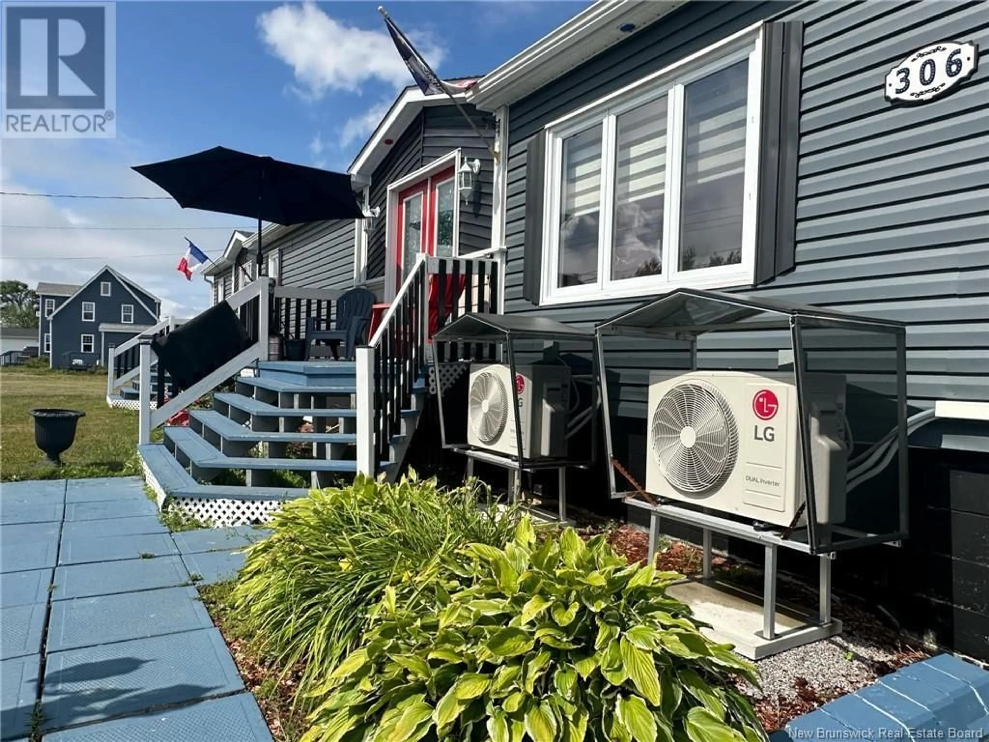 A pic from outside/outdoor area/front of a property/back of a property/a pic from drone, street for 306 rue Acadie, Grande-Anse New Brunswick E8N1C1