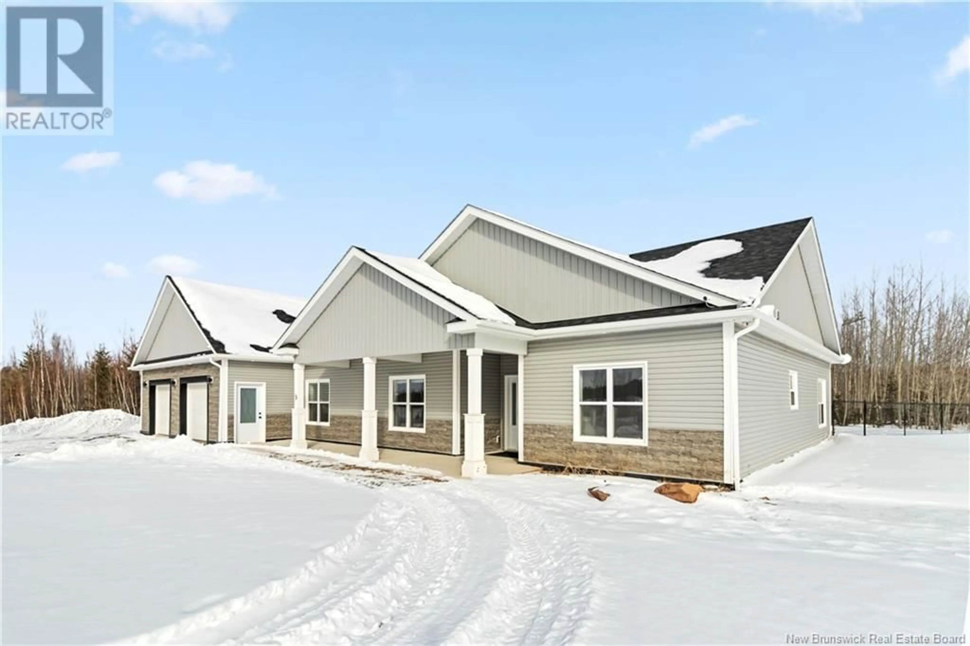 Home with vinyl exterior material, street for 9 FLYNN STREET, Pine Glen New Brunswick E1J0H5