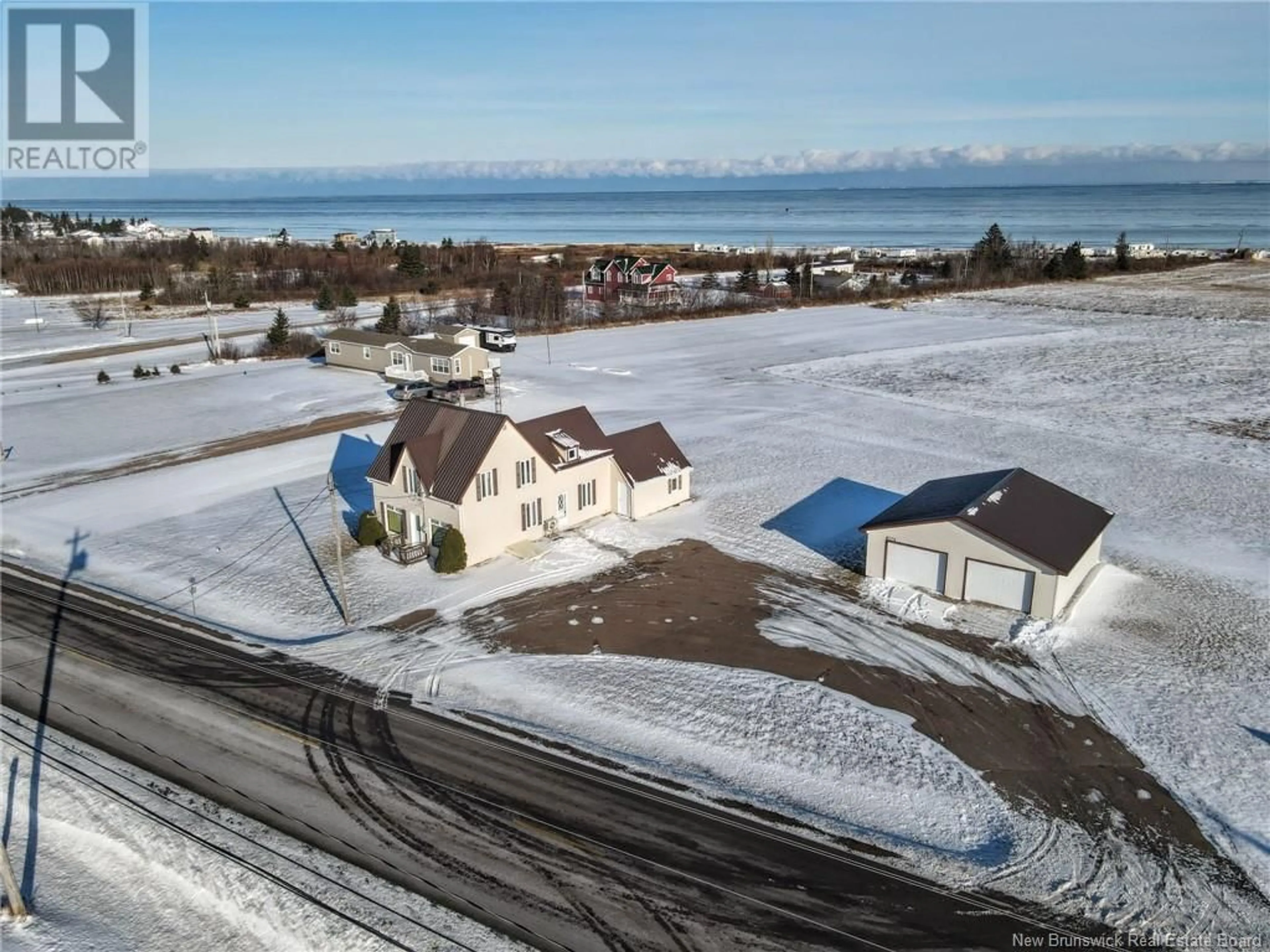 A pic from outside/outdoor area/front of a property/back of a property/a pic from drone, unknown for 2002 RTE 950, Petit-Cap New Brunswick E4N2J4