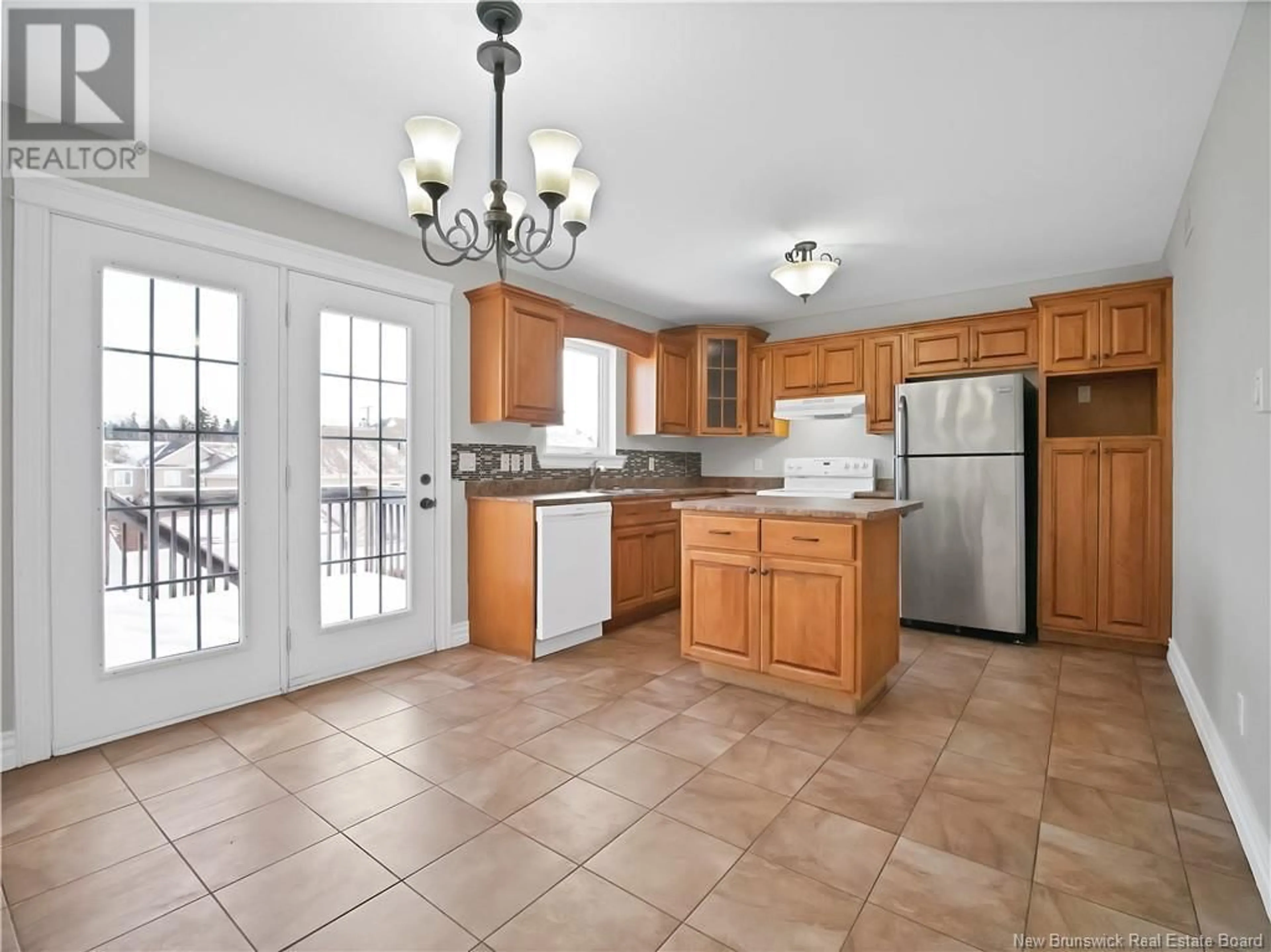 Open concept kitchen, ceramic/tile floor for 36 Rainford Court, Moncton New Brunswick E1G0T4