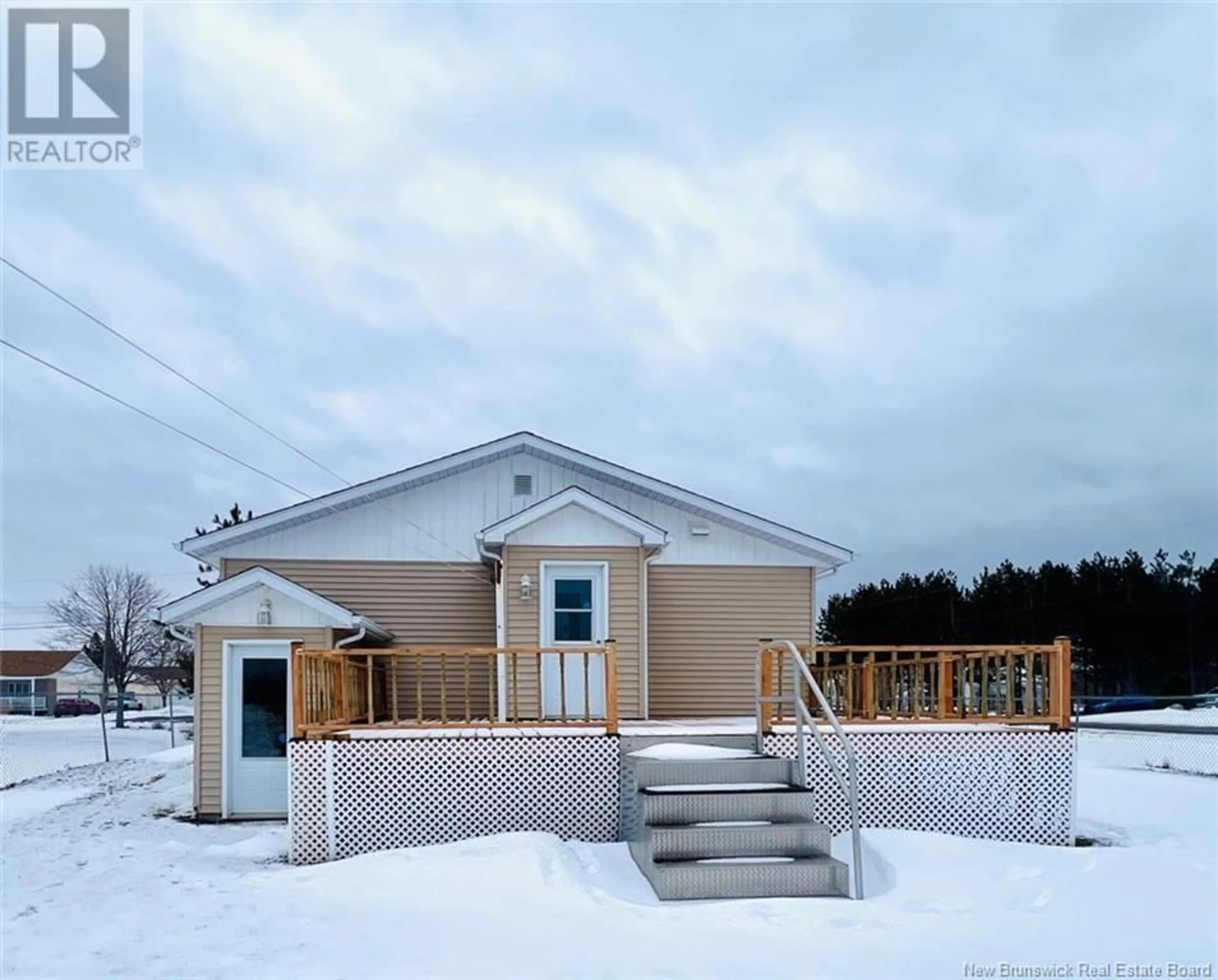 A pic from outside/outdoor area/front of a property/back of a property/a pic from drone, building for 63 rue Parisé, Caraquet New Brunswick E1W1B6