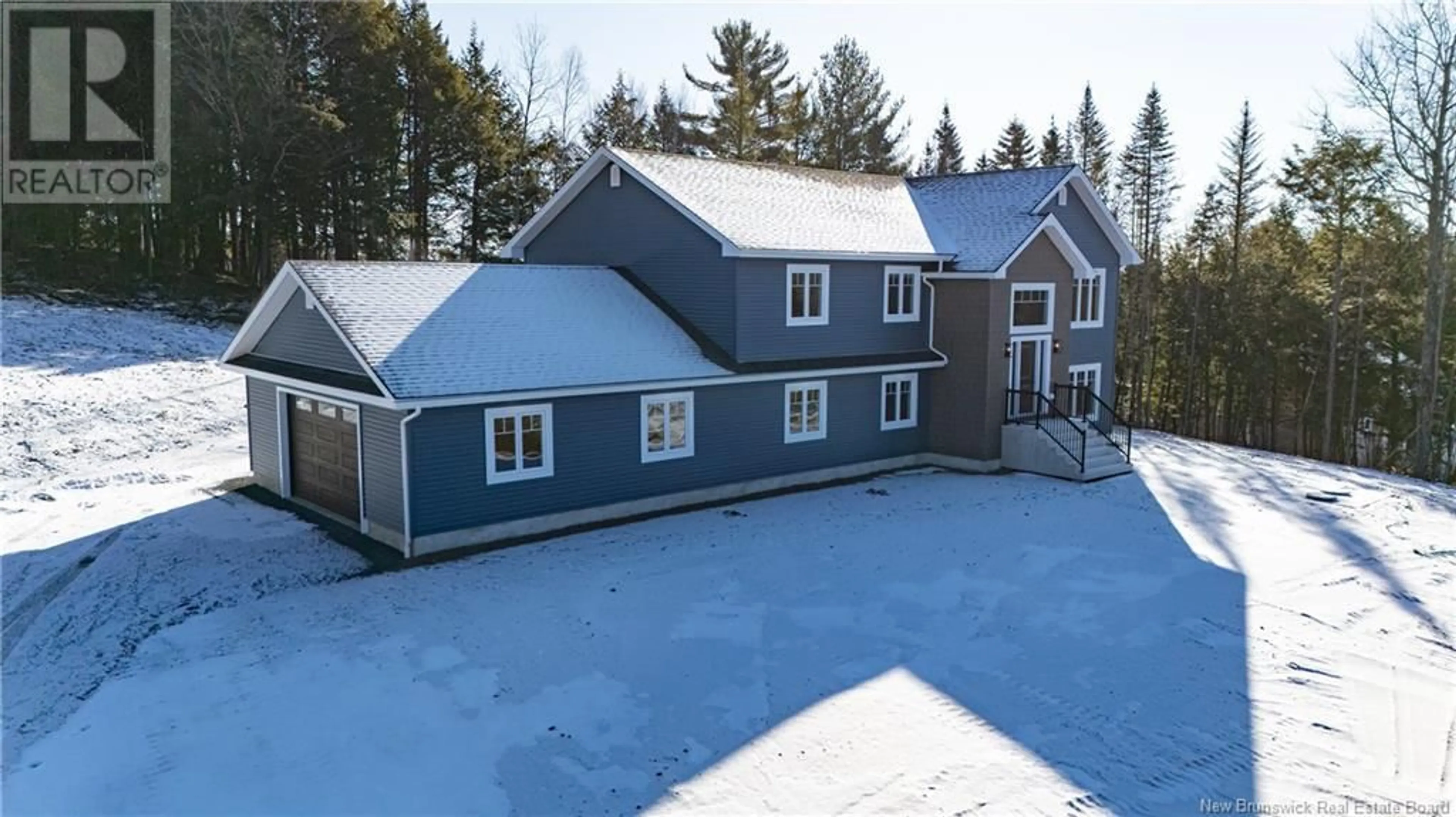 A pic from outside/outdoor area/front of a property/back of a property/a pic from drone, building for 84 Country Wood Lane, Fredericton New Brunswick E3A0X7