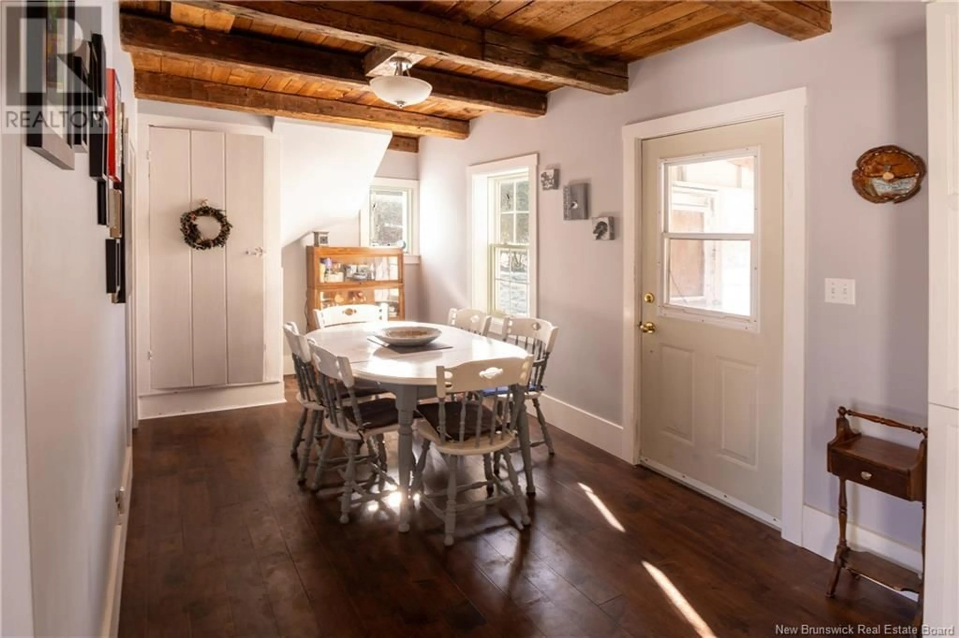 Dining room, wood/laminate floor for 2930 Main Street, Hillsborough New Brunswick E4H2Y9