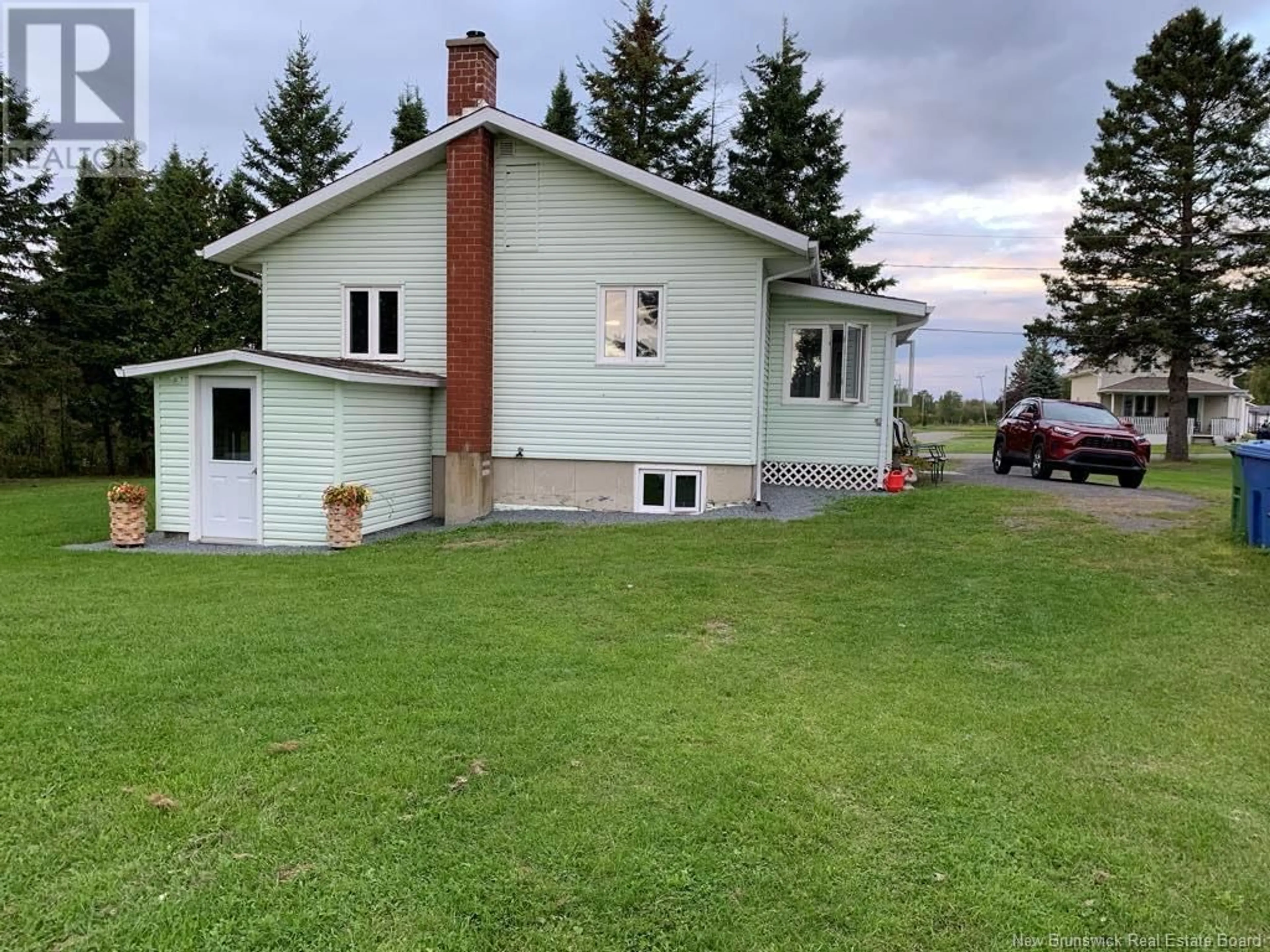 A pic from outside/outdoor area/front of a property/back of a property/a pic from drone, street for 6 FOURNIER STREET, Rivière-Verte New Brunswick E7C2R7