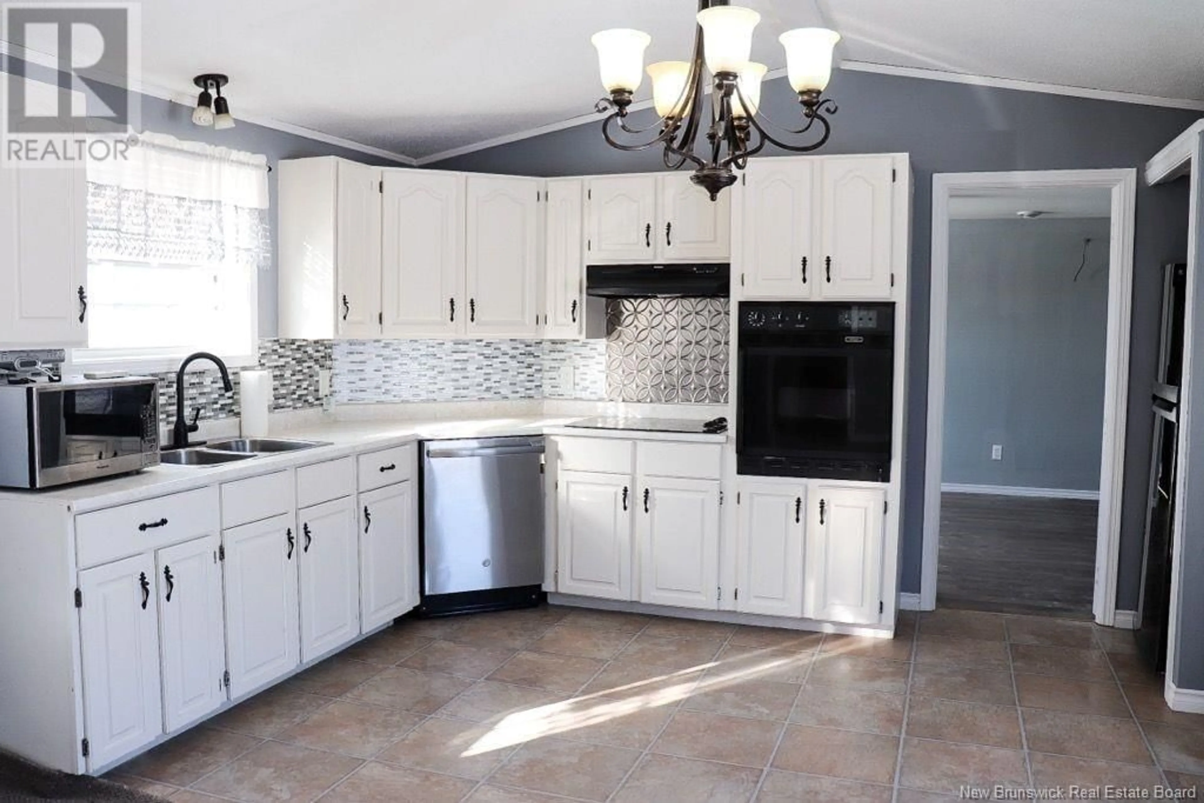 Open concept kitchen, ceramic/tile floor for 9373 Route 126, Kent Junction New Brunswick E4Y2J1