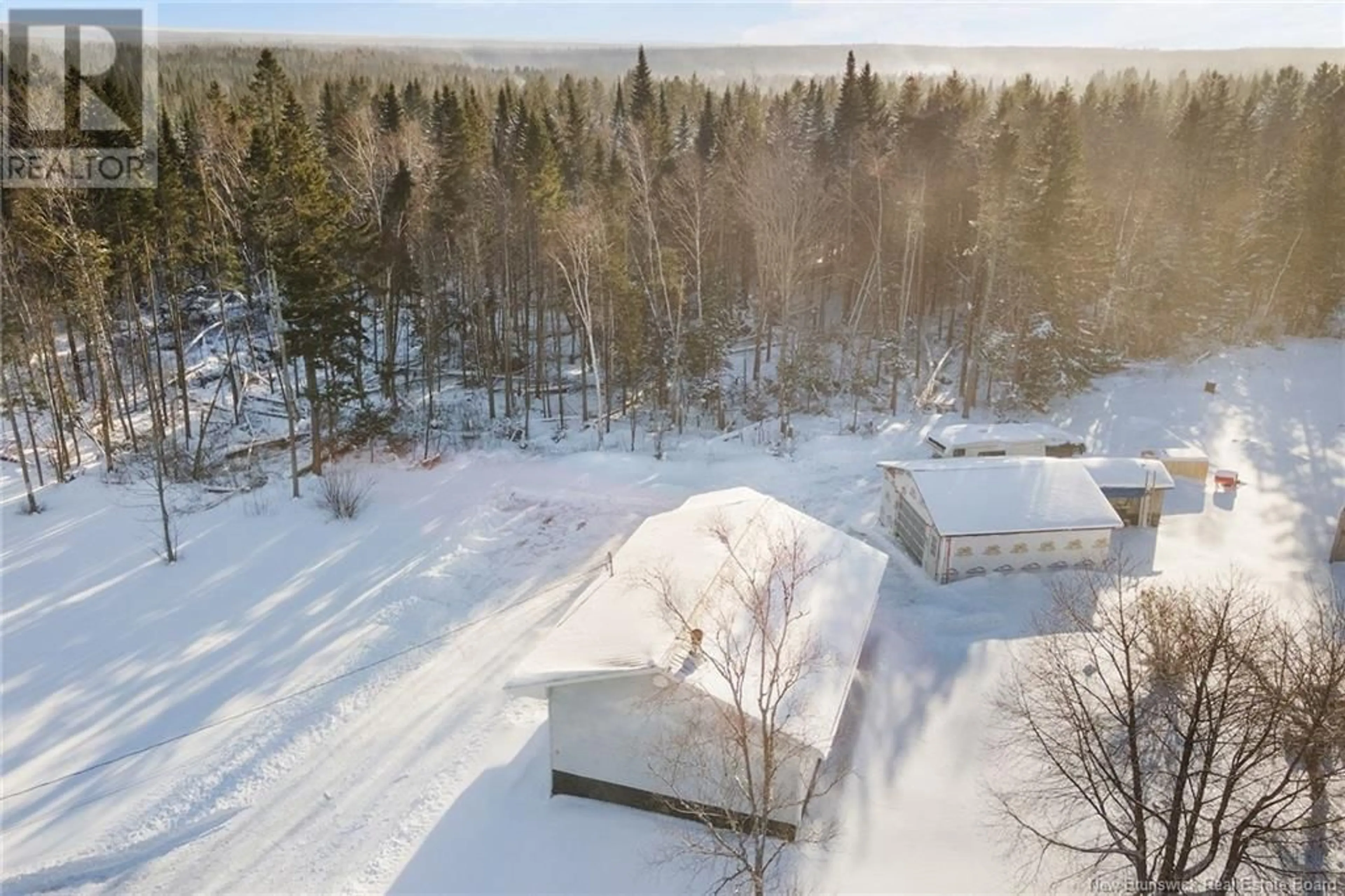 A pic from outside/outdoor area/front of a property/back of a property/a pic from drone, forest/trees view for 1077 Kingsley Road, Birdton New Brunswick E3A6C8