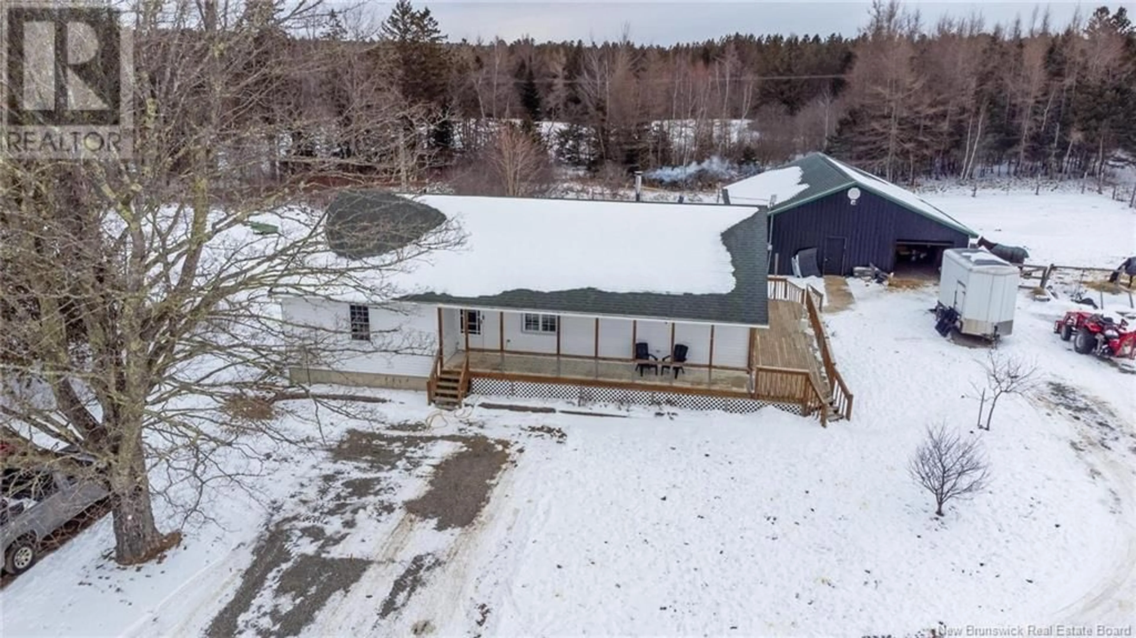 A pic from outside/outdoor area/front of a property/back of a property/a pic from drone, building for 899 Route 170, Oak Bay New Brunswick E3L4A7