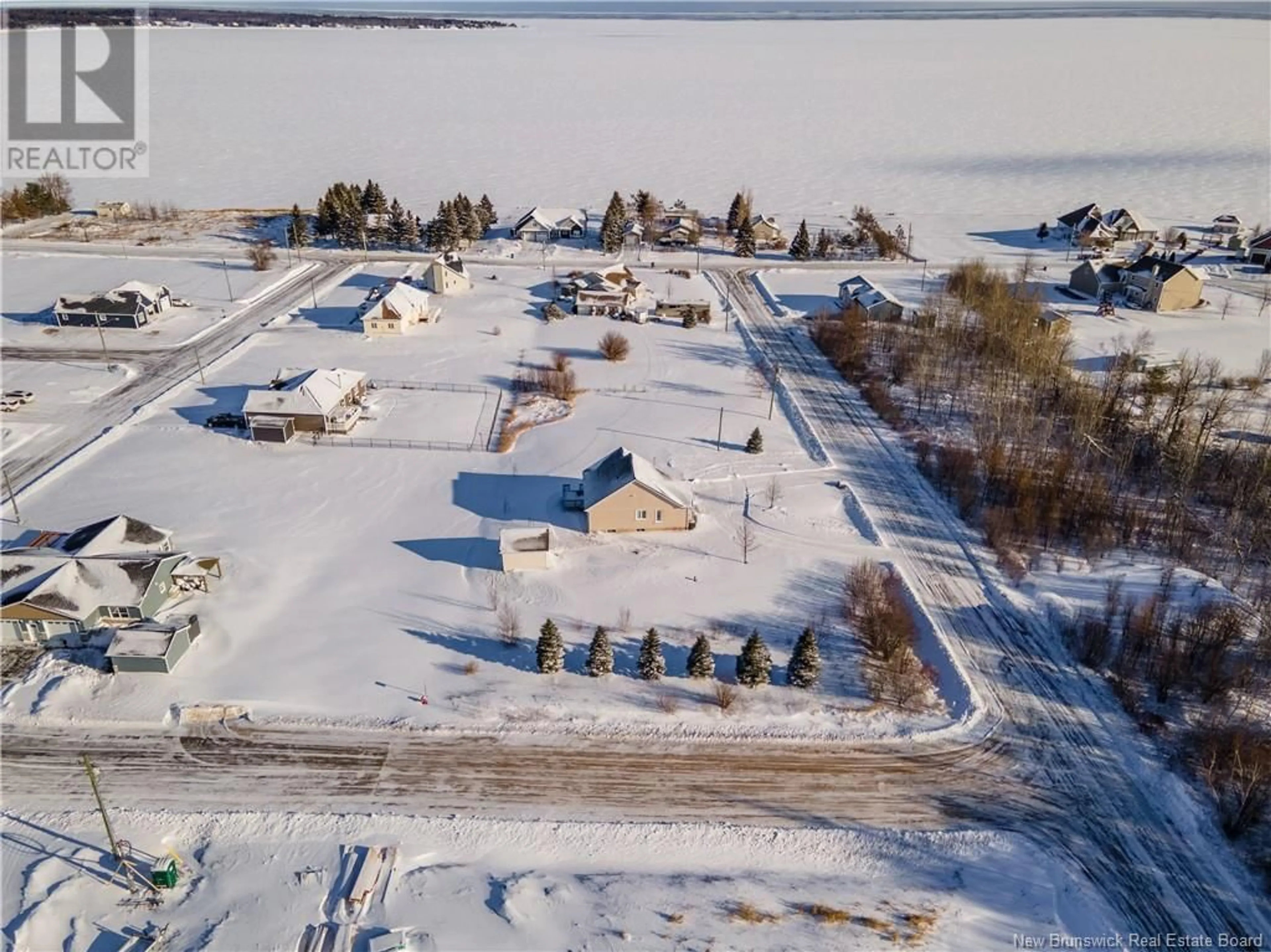 A pic from outside/outdoor area/front of a property/back of a property/a pic from drone, water/lake/river/ocean view for 48 LOUIS-BOURG STREET, Bouctouche New Brunswick E4S3N7