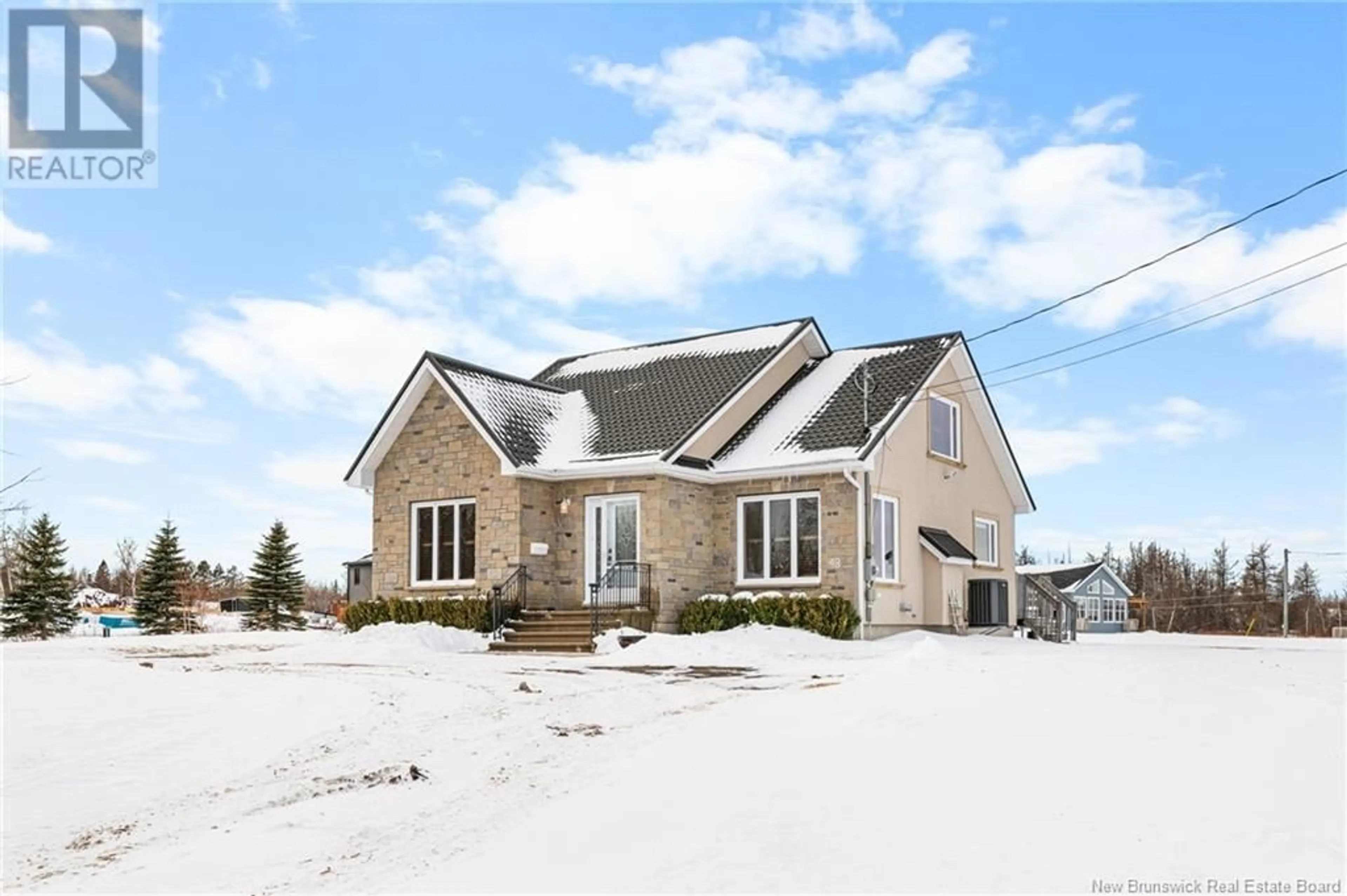 Home with brick exterior material, street for 48 Louis-Bourg Street, Bouctouche New Brunswick E4S3N7