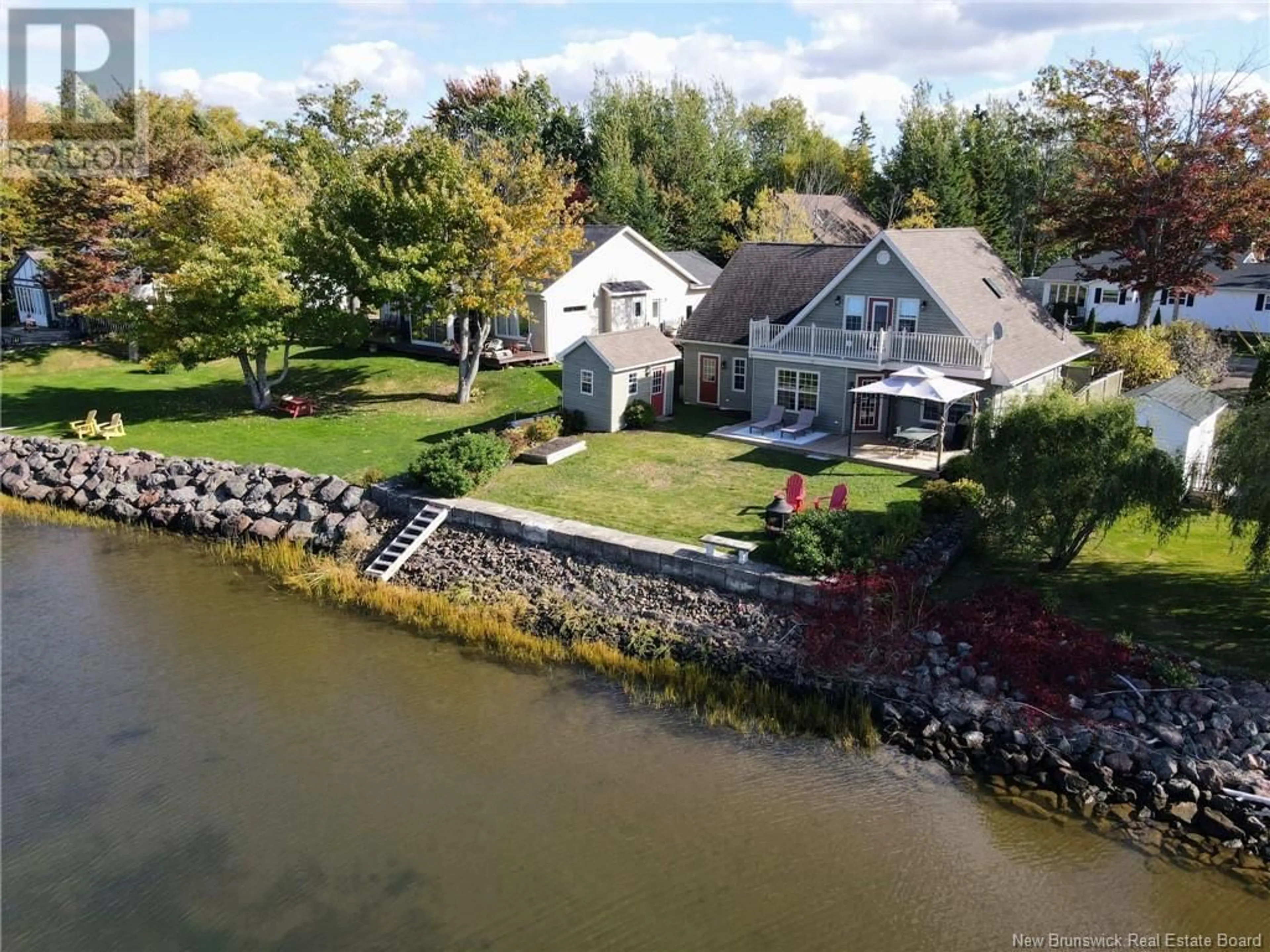 A pic from outside/outdoor area/front of a property/back of a property/a pic from drone, water/lake/river/ocean view for 71 Evergreen Drive, Shediac New Brunswick E4P1R9