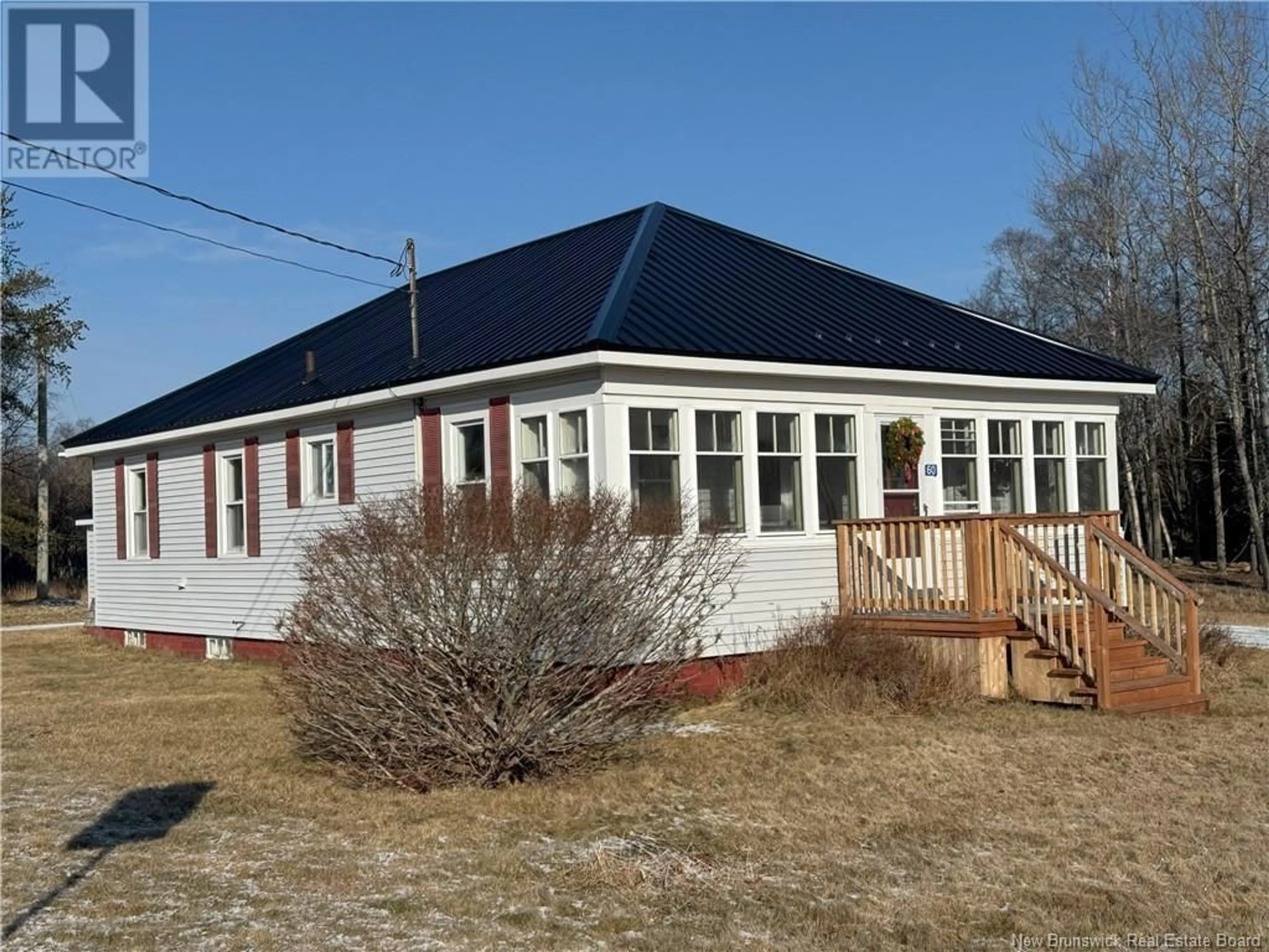 Home with vinyl exterior material, building for 60 Wallace Cove Road, Blacks Harbour New Brunswick E5H1H1