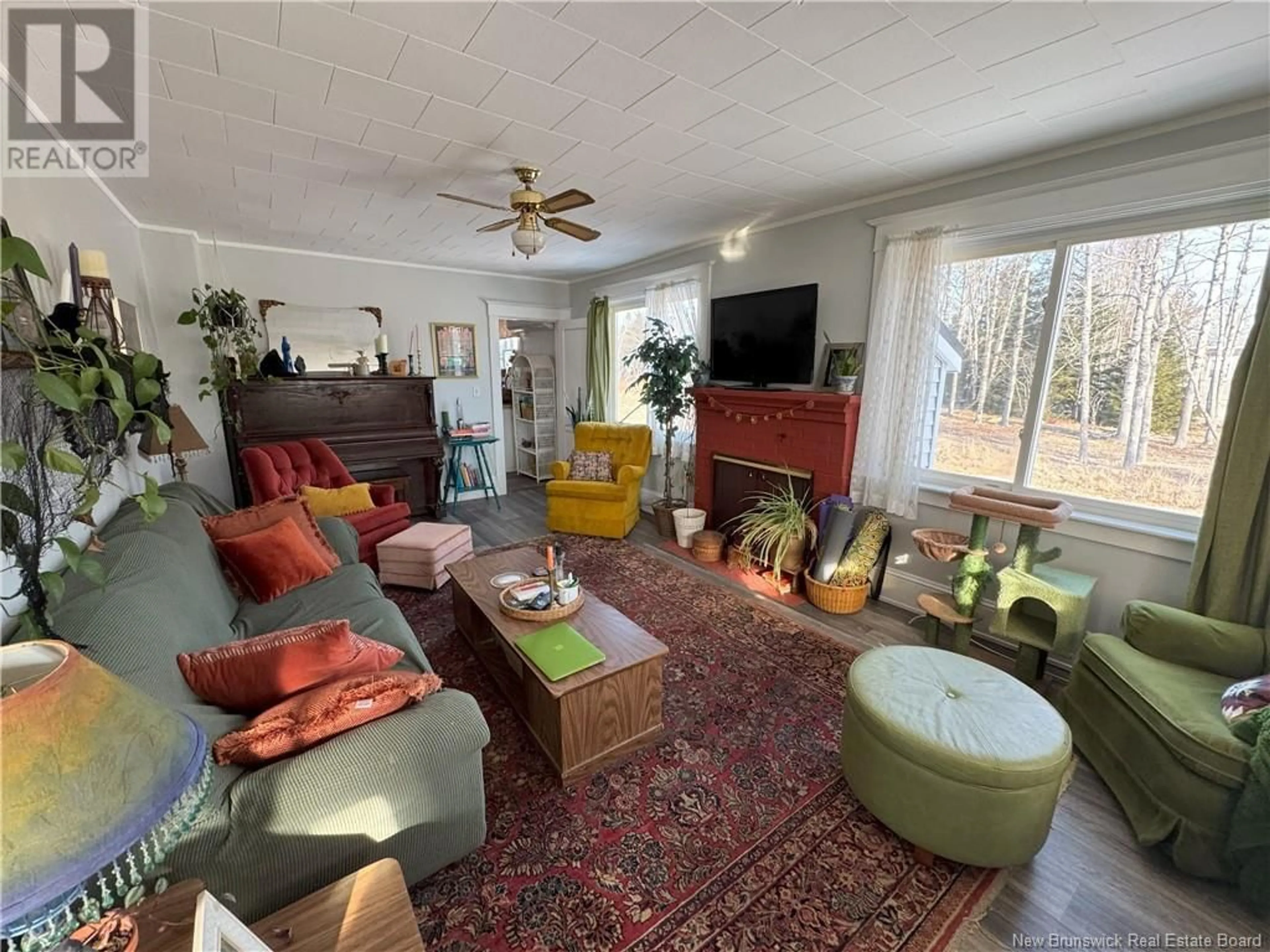 Living room with furniture, unknown for 60 Wallace Cove Road, Blacks Harbour New Brunswick E5H1H1