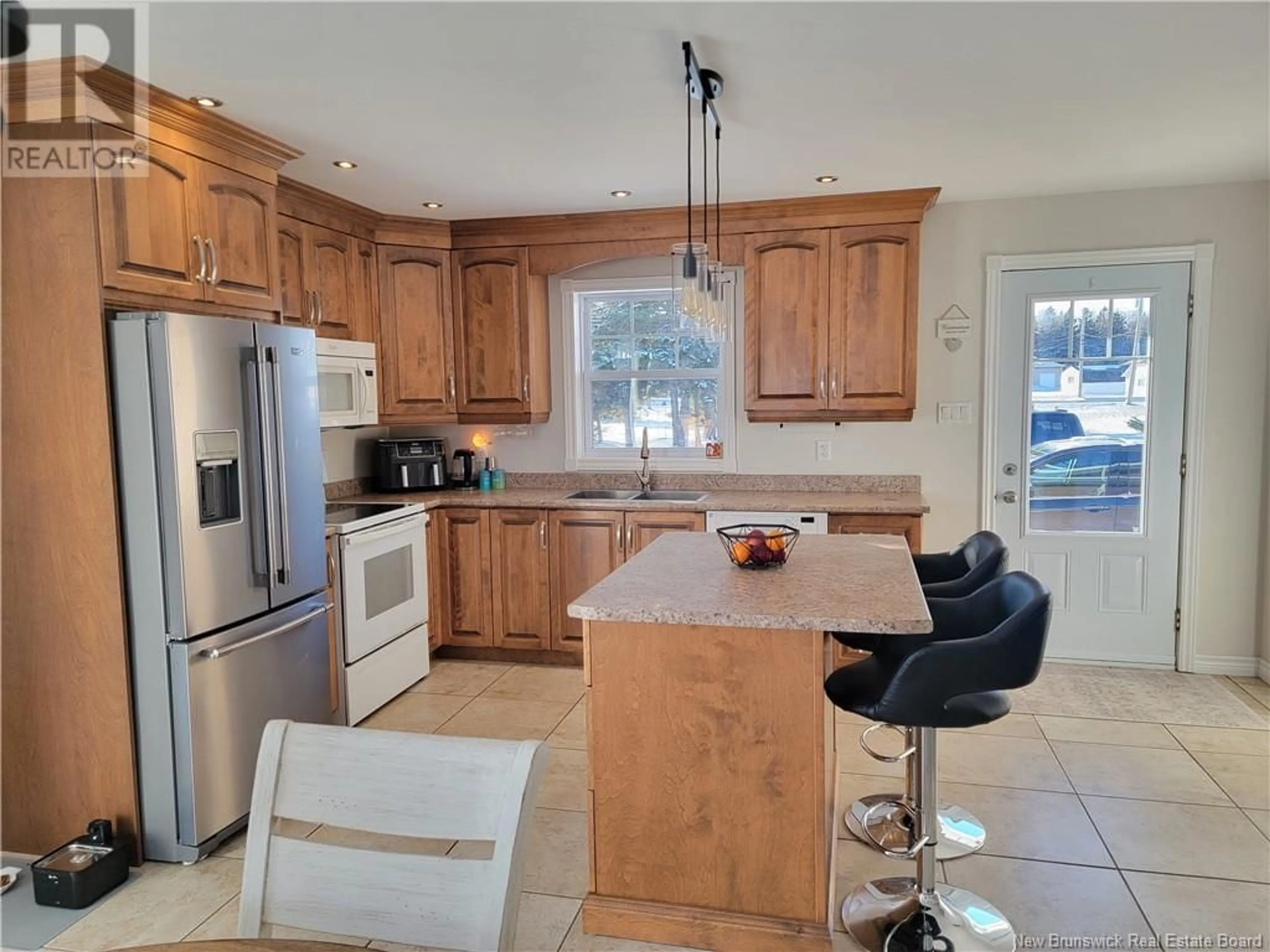 Open concept kitchen, ceramic/tile floor for 597 Principale, Pointe-Verte New Brunswick E8J2P8