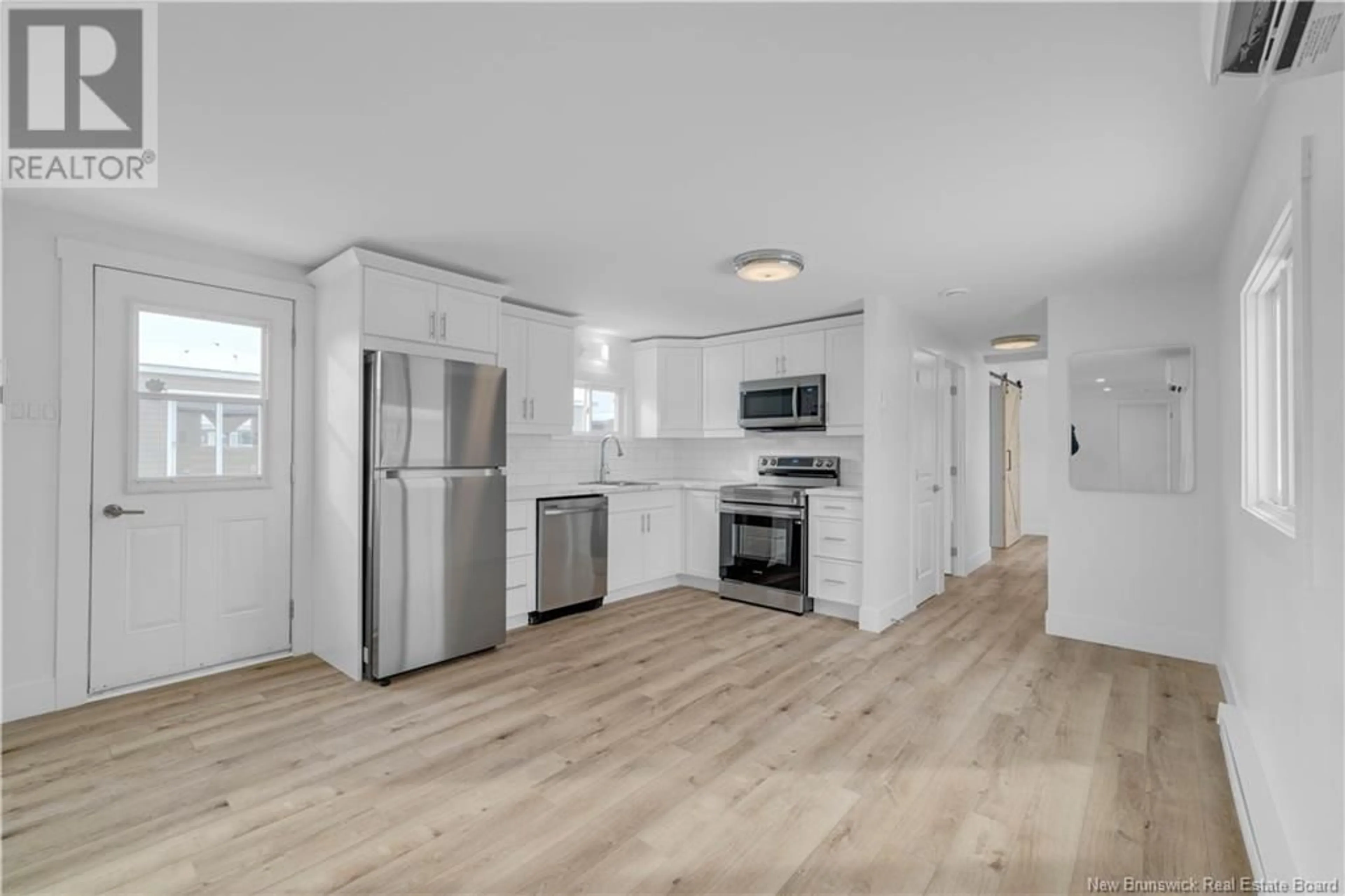 Open concept kitchen, unknown for 47 Darrell Avenue, Quispamsis New Brunswick E2G1S8