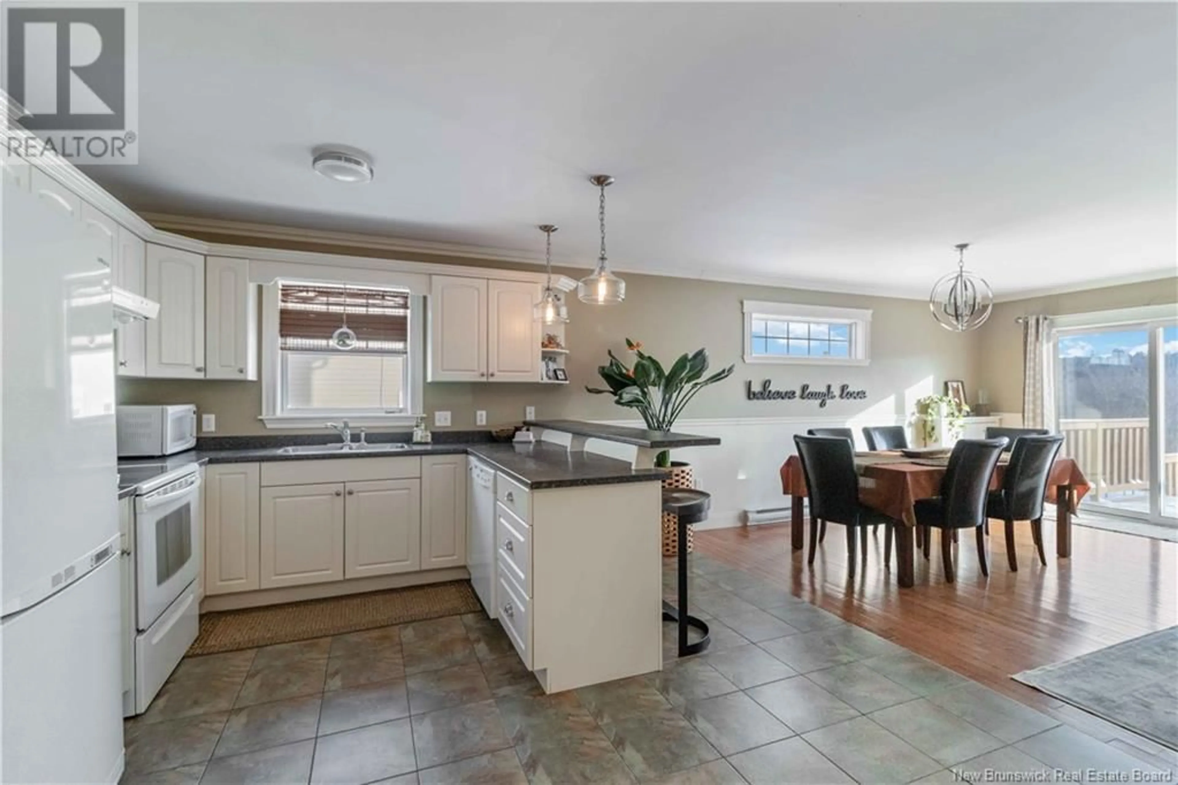 Open concept kitchen, ceramic/tile floor for 564 Canada Street Unit# 4, Fredericton New Brunswick E3A4A7