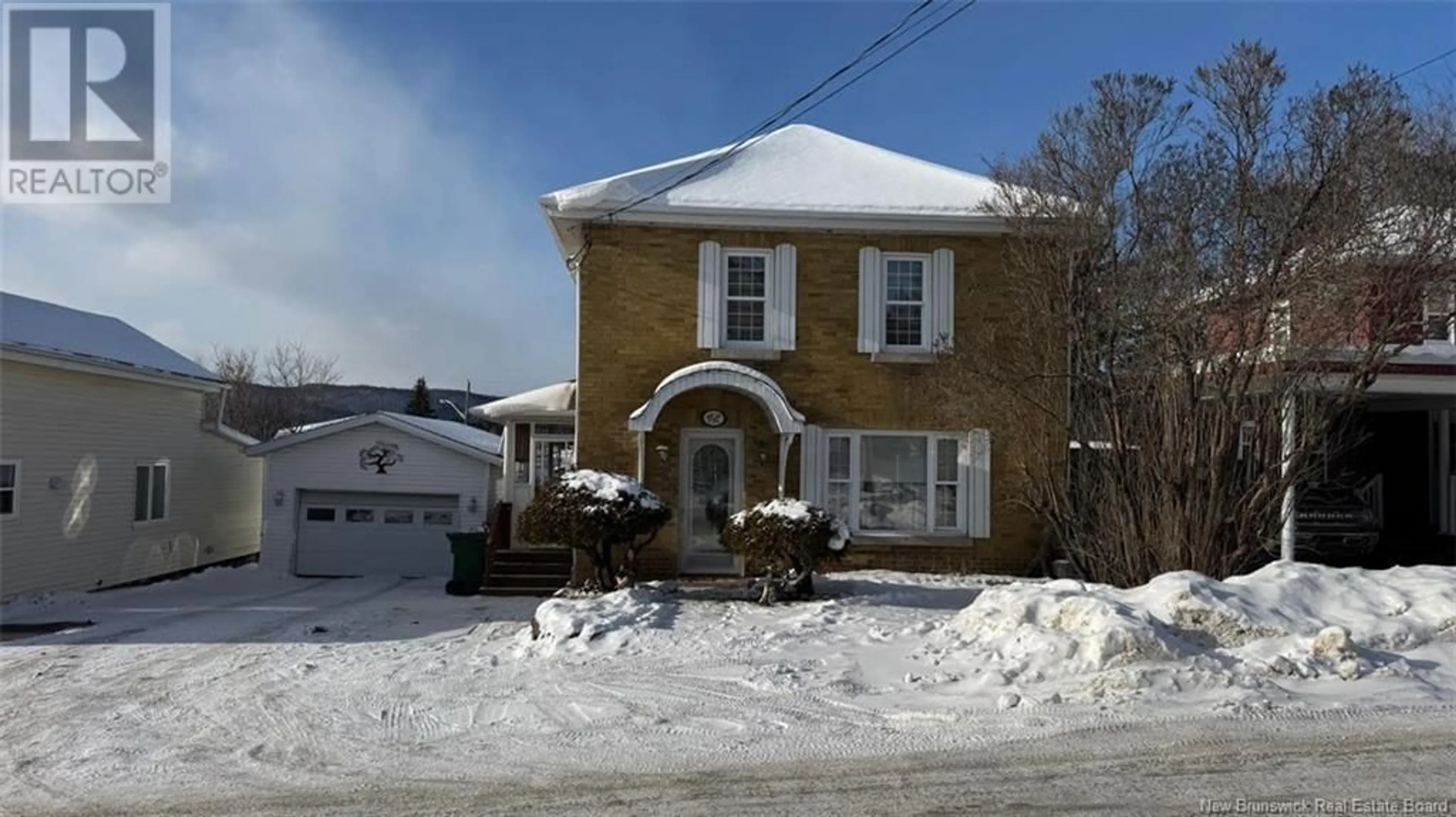 Home with brick exterior material, street for 42 39e Avenue, Edmundston New Brunswick E3V2X2