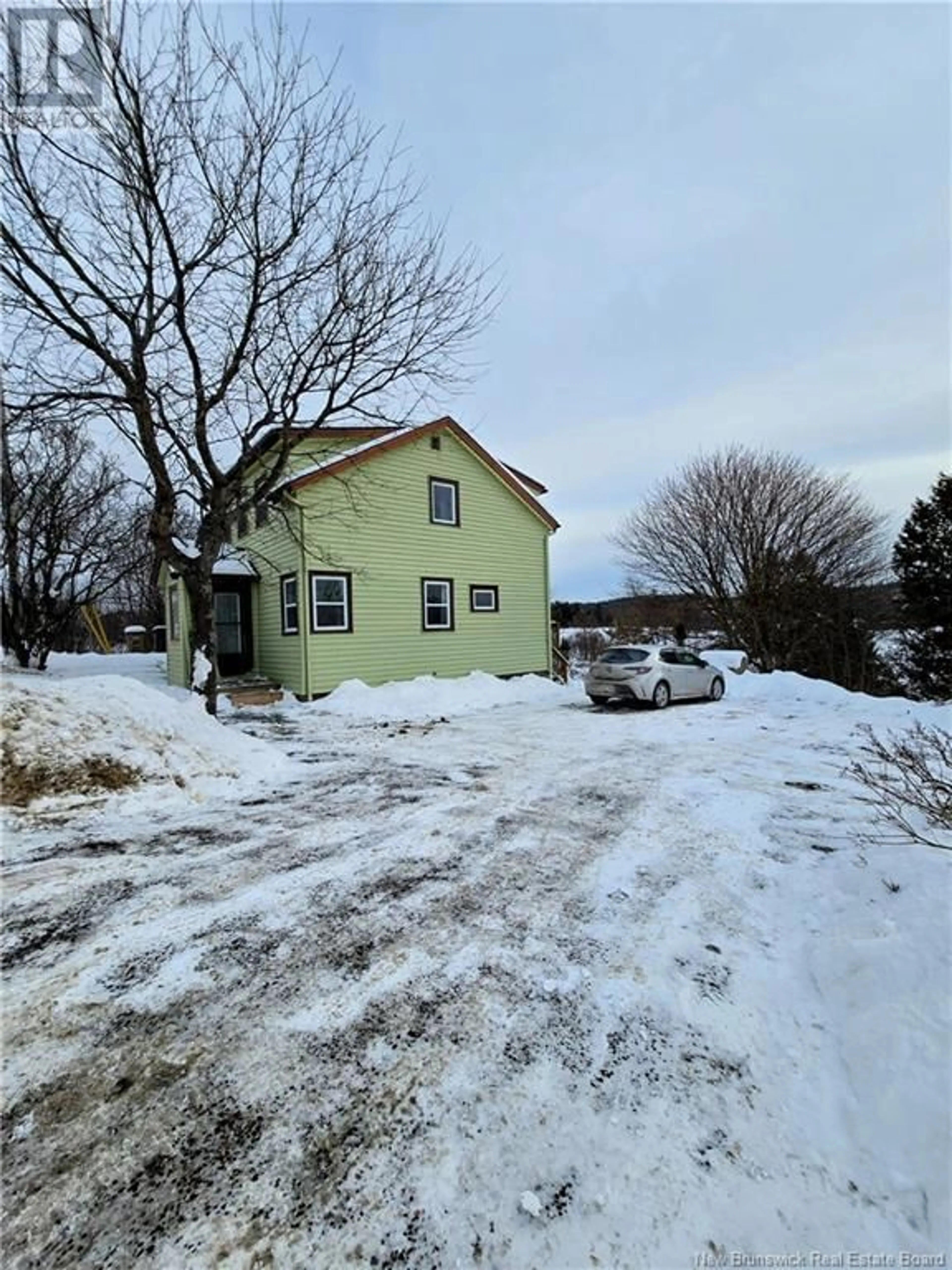 A pic from outside/outdoor area/front of a property/back of a property/a pic from drone, street for 1548 Loch Lomond Road, Saint John New Brunswick E2J1Z7