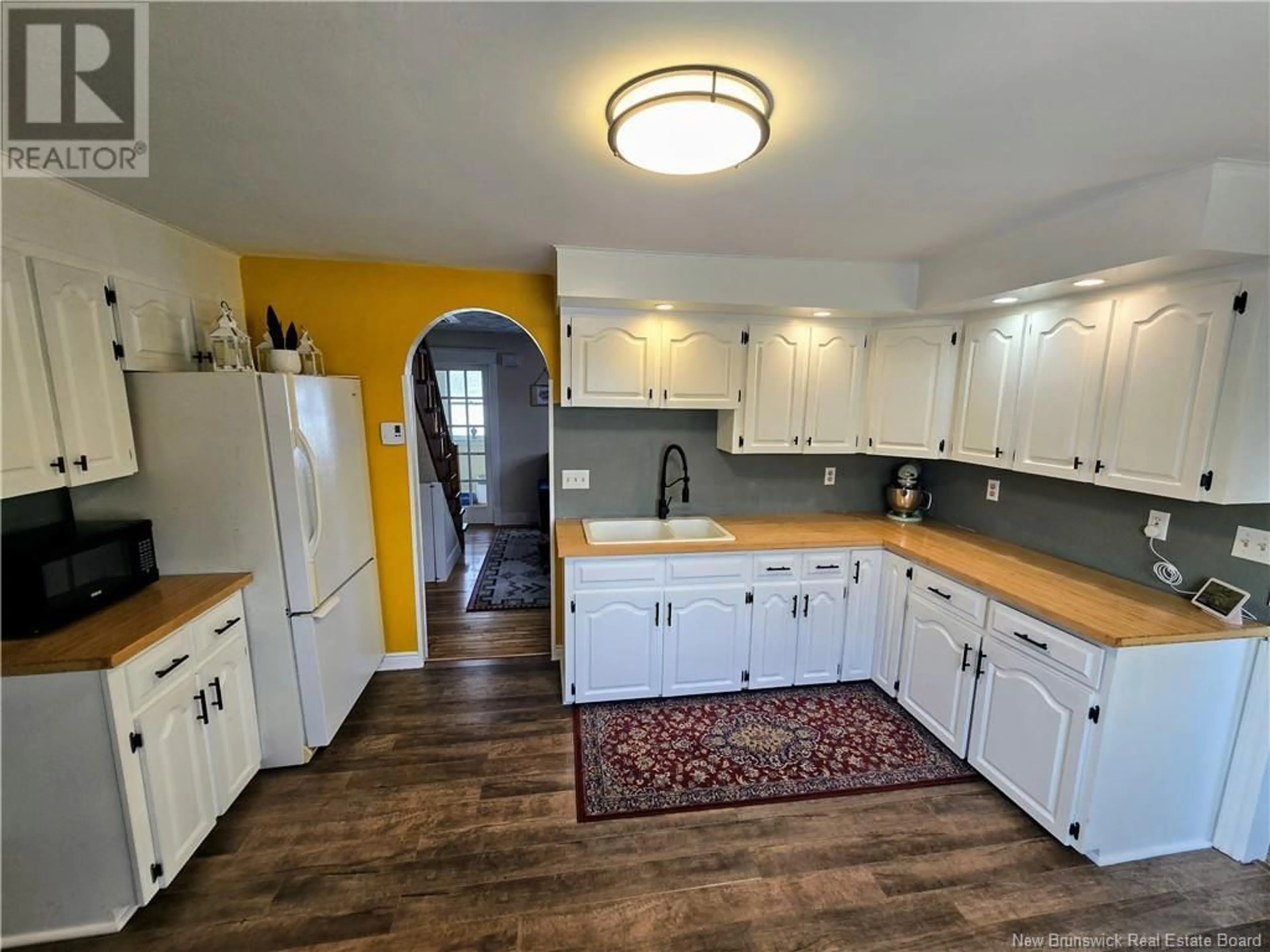 Open concept kitchen, ceramic/tile floor for 1548 Loch Lomond Road, Saint John New Brunswick E2J1Z7