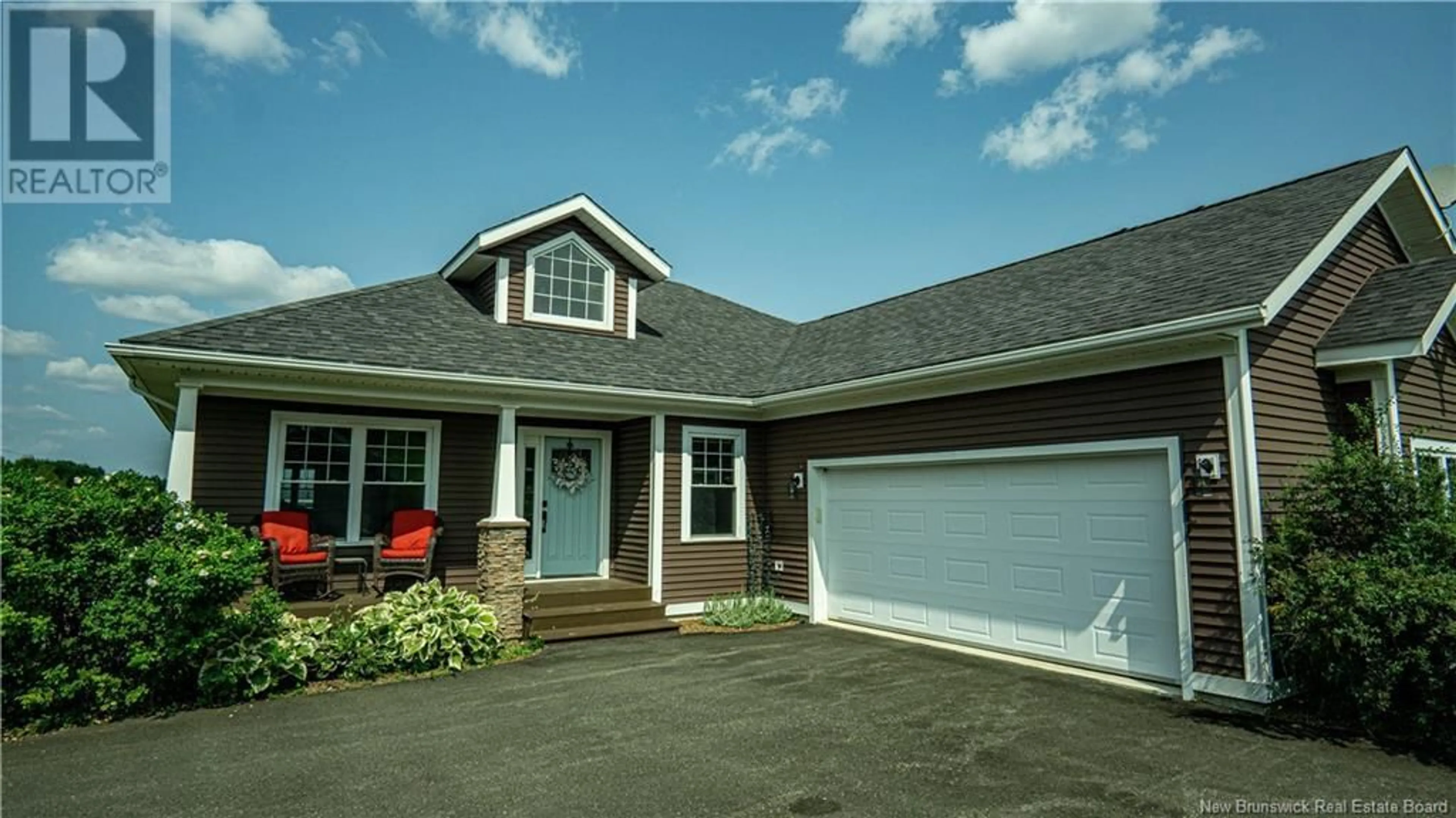 Home with vinyl exterior material, street for 100 Keenan Drive, Bedell New Brunswick E7M5C7