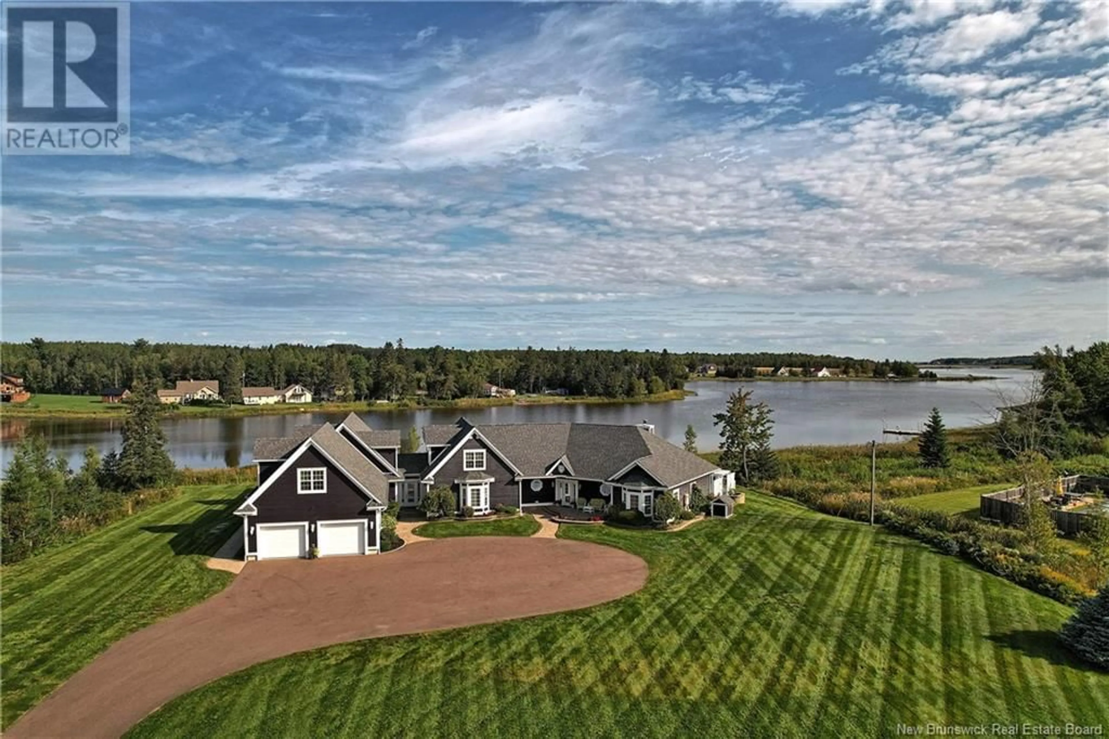 A pic from outside/outdoor area/front of a property/back of a property/a pic from drone, water/lake/river/ocean view for 46 Leonce Street, Haute-Aboujagane New Brunswick E4P9C7