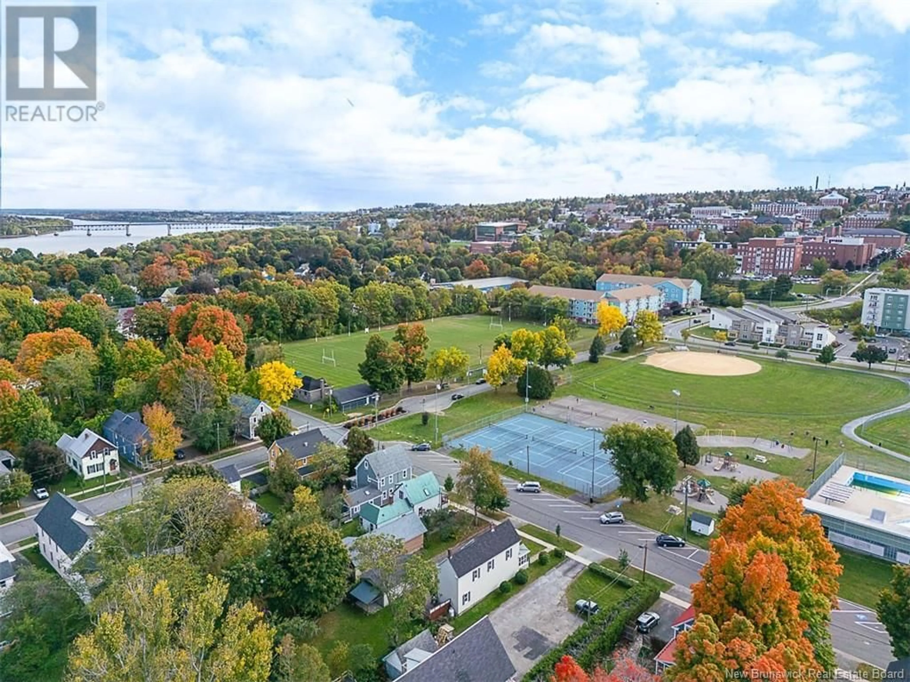 A pic from outside/outdoor area/front of a property/back of a property/a pic from drone, water/lake/river/ocean view for 748 CHURCHILL ROW, Fredericton New Brunswick E3B1P8