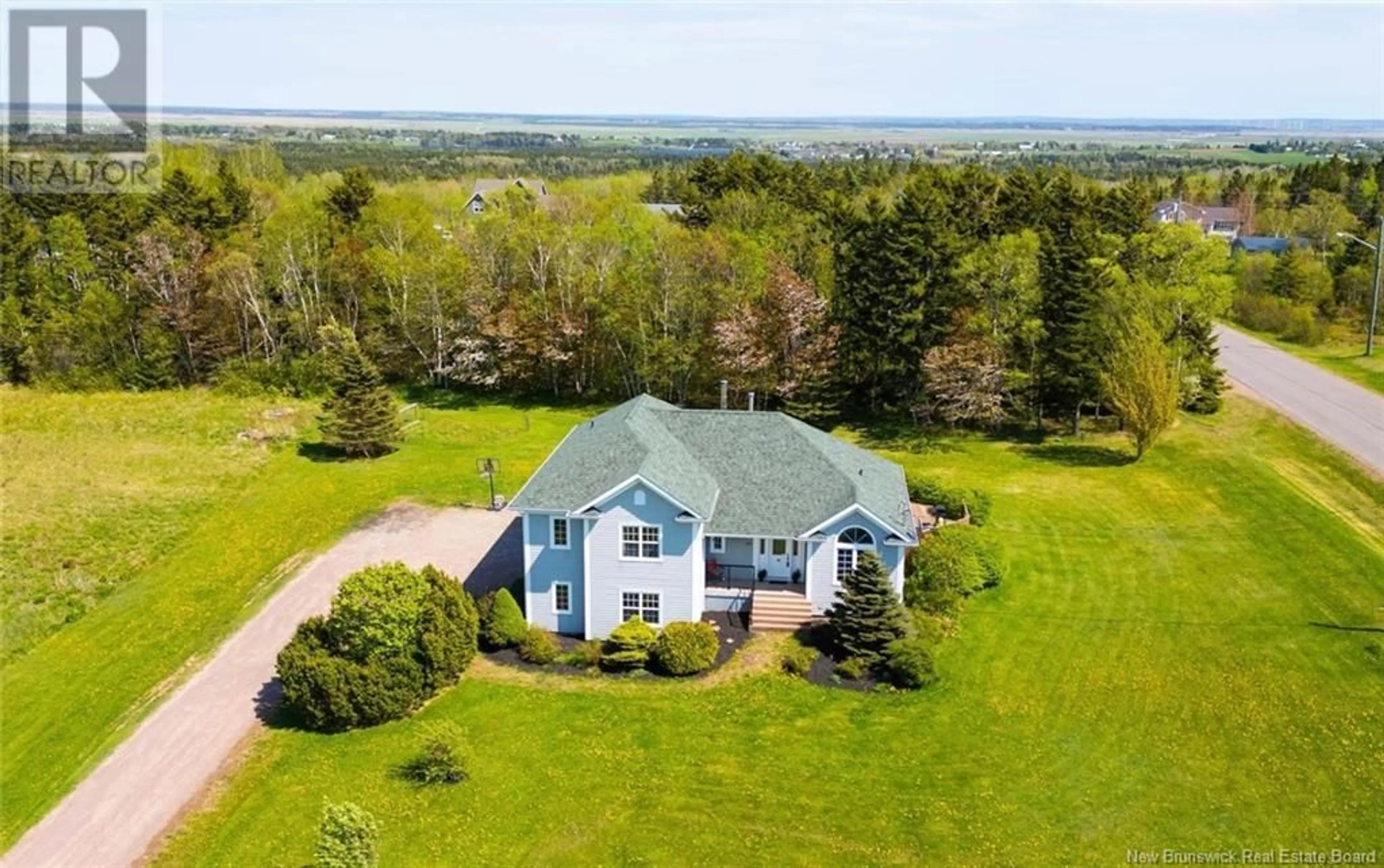 A pic from outside/outdoor area/front of a property/back of a property/a pic from drone, water/lake/river/ocean view for 79 Stanley Drive, Sackville New Brunswick E4L1R2