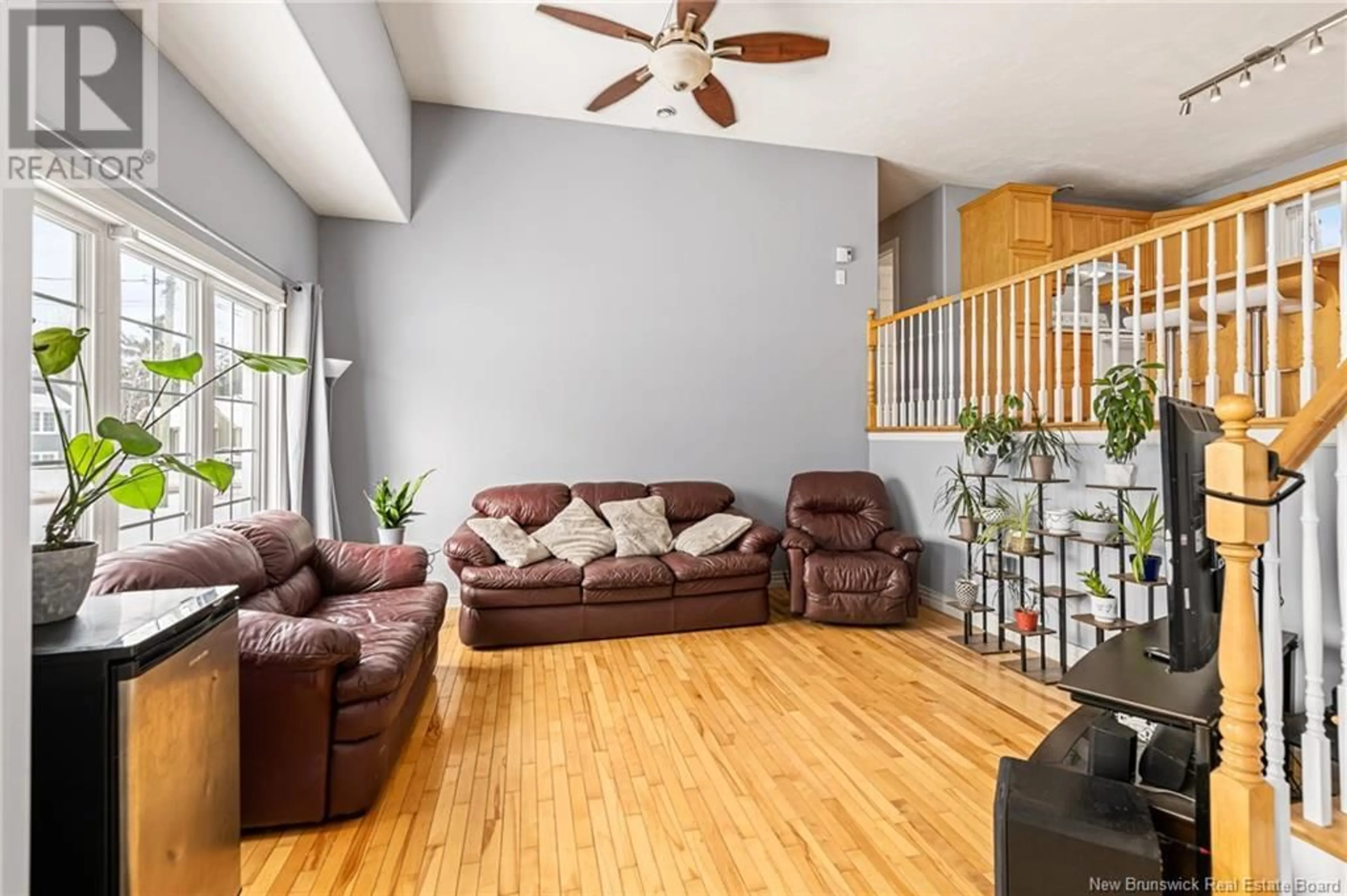 Living room with furniture, wood/laminate floor for 32 Manon Street, Shediac New Brunswick E4P0A9