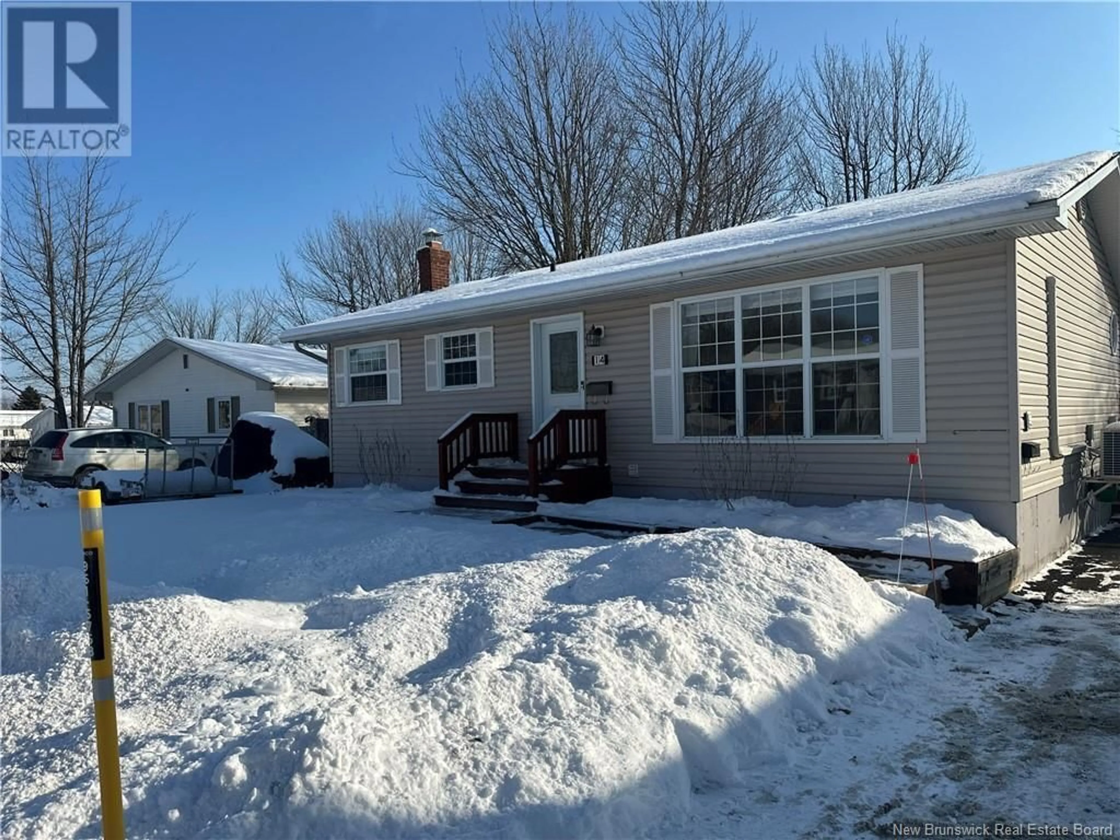 Home with vinyl exterior material, street for 14 Columbus Avenue, Moncton New Brunswick E1A5N7