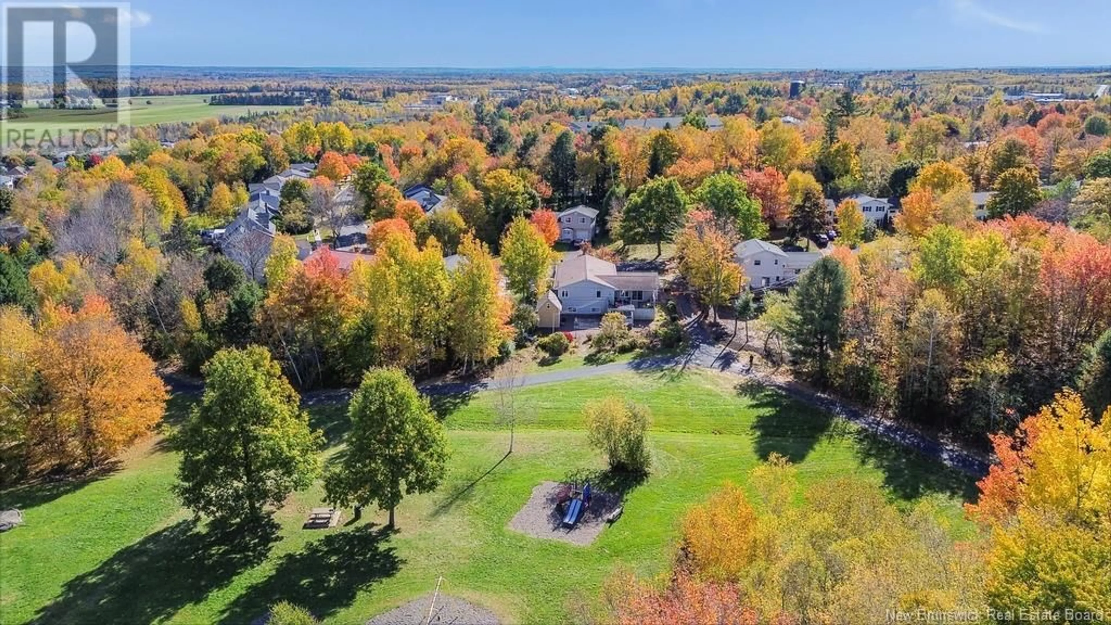 A pic from outside/outdoor area/front of a property/back of a property/a pic from drone, forest/trees view for 81 Pugsley Street, Fredericton New Brunswick E3B6J2