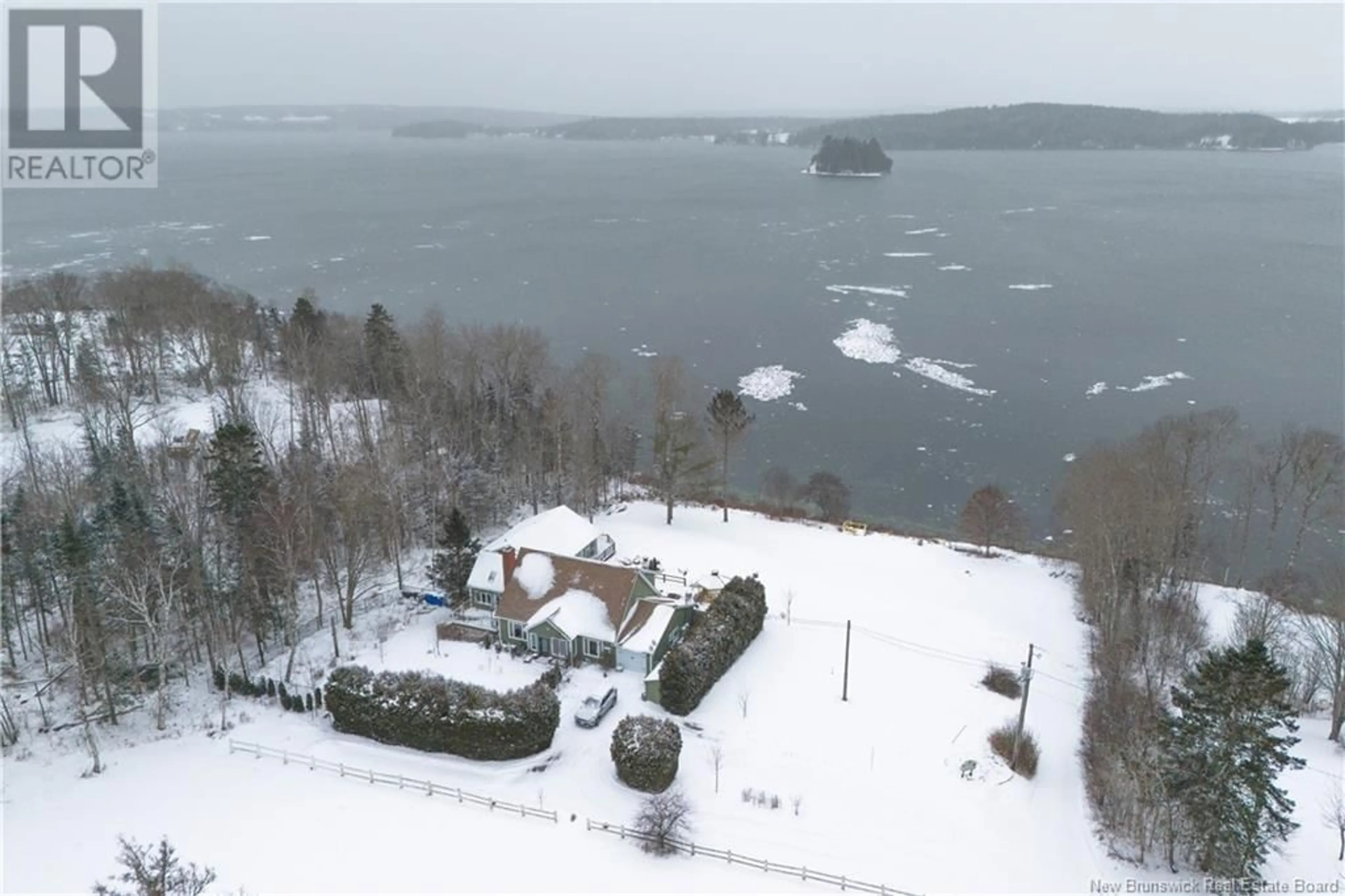 A pic from outside/outdoor area/front of a property/back of a property/a pic from drone, water/lake/river/ocean view for 14 Murray Lane, Oak Bay New Brunswick E3L4H9