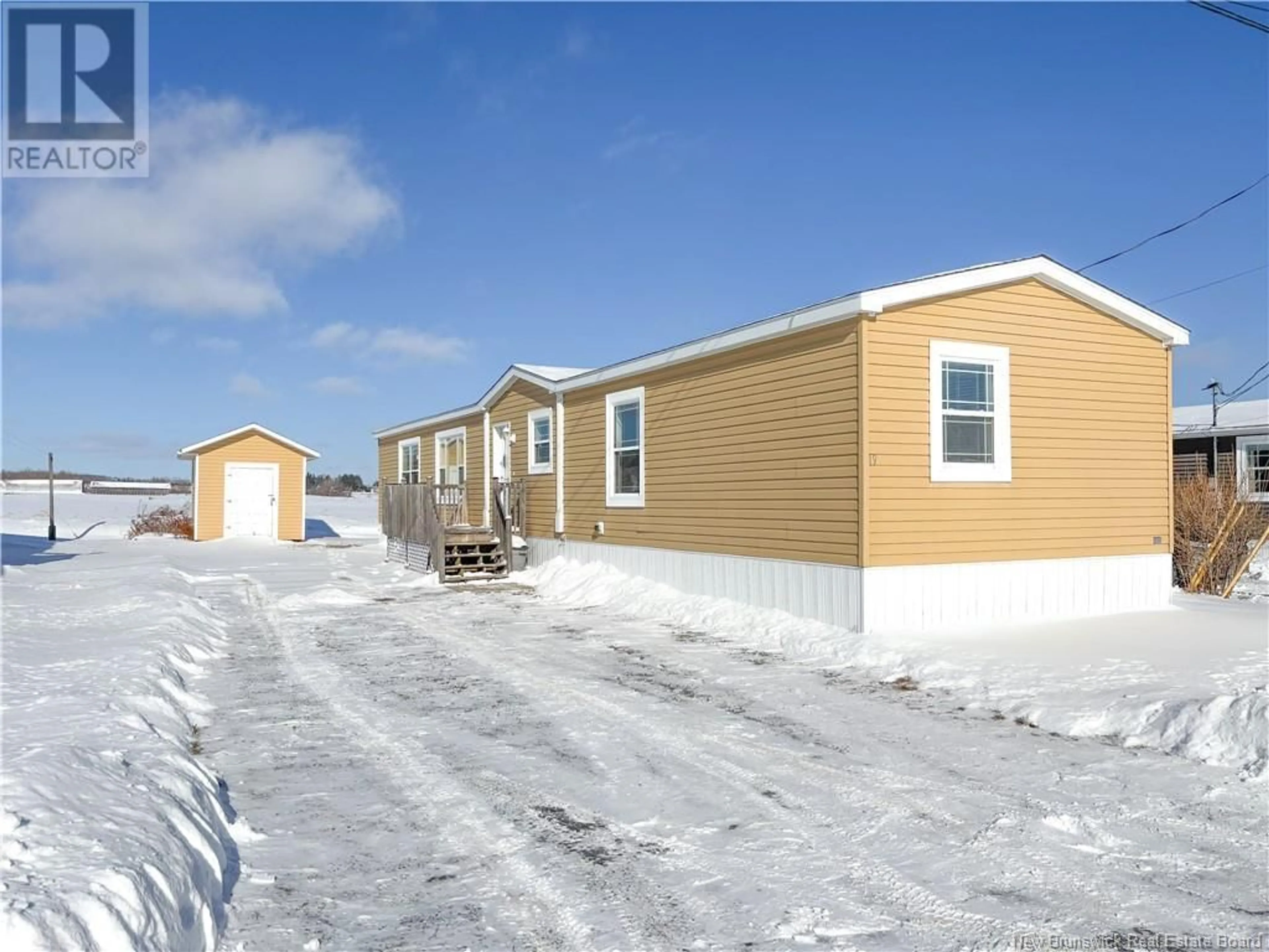 Home with vinyl exterior material, street for 19 Carr Lane, Jacksonville New Brunswick E7M0G2