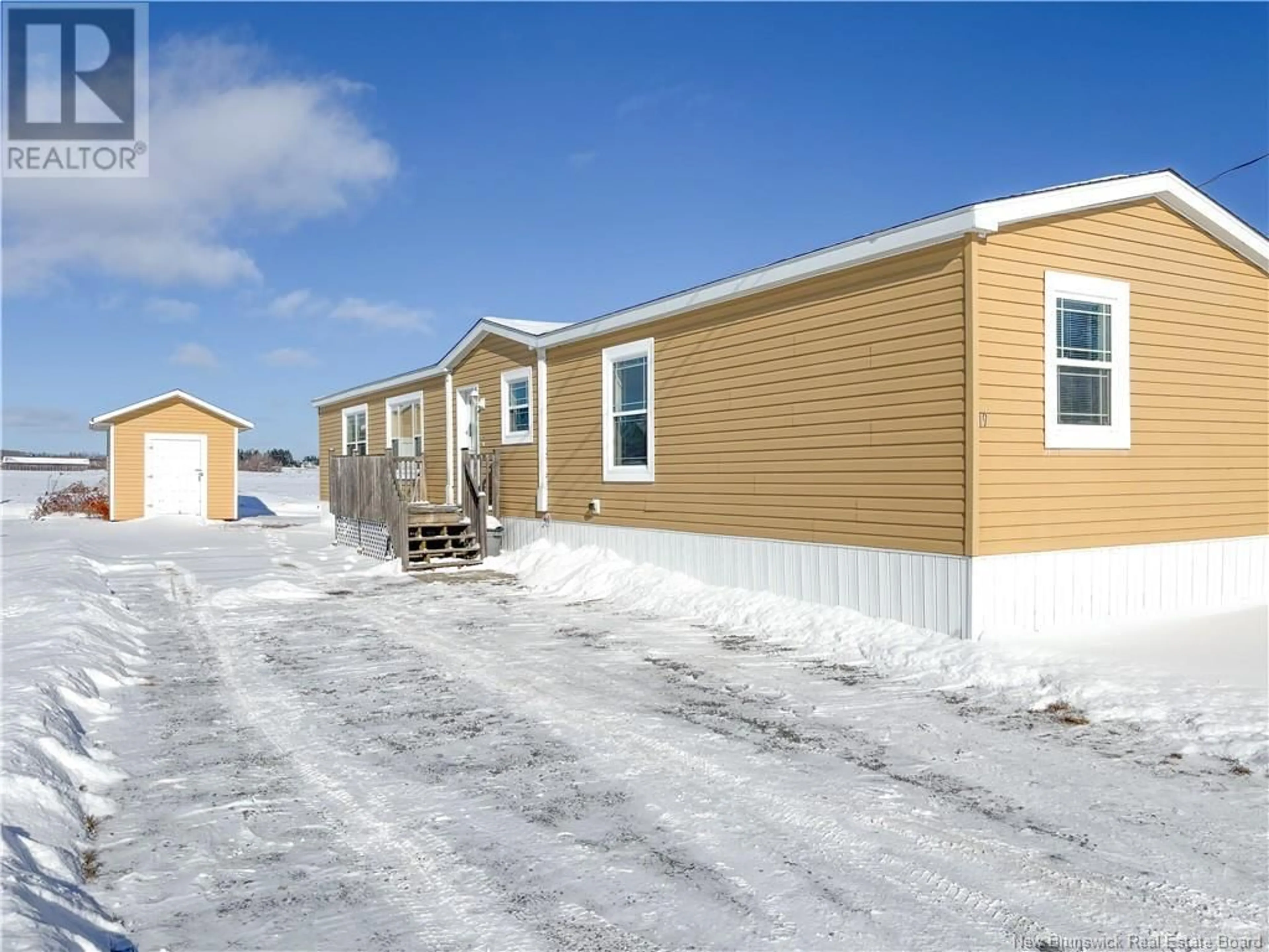 Home with vinyl exterior material, street for 19 Carr Lane, Jacksonville New Brunswick E7M0G2