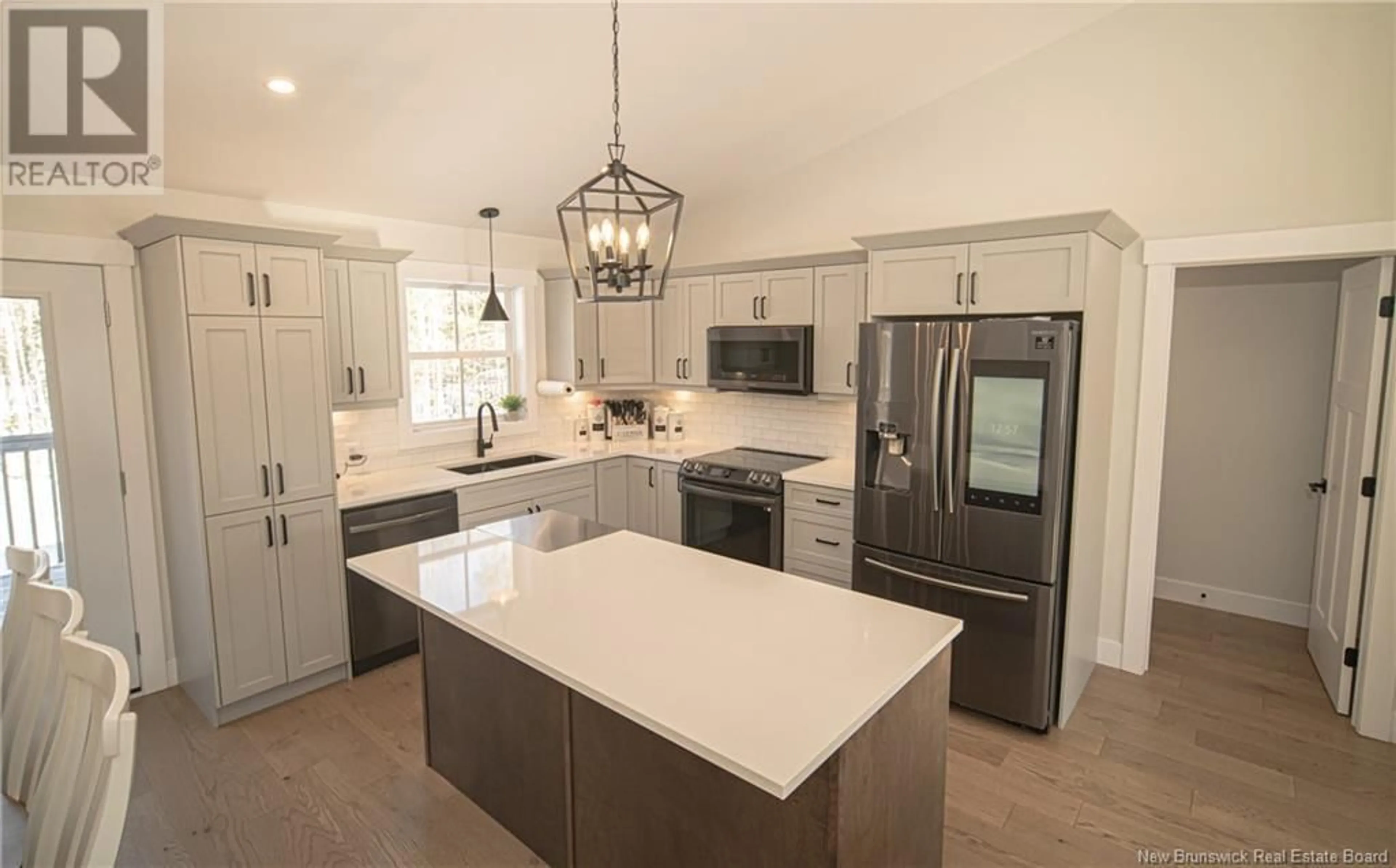 Open concept kitchen, ceramic/tile floor for 12 Barbara Drive, Rusagonis New Brunswick E3B0Y3