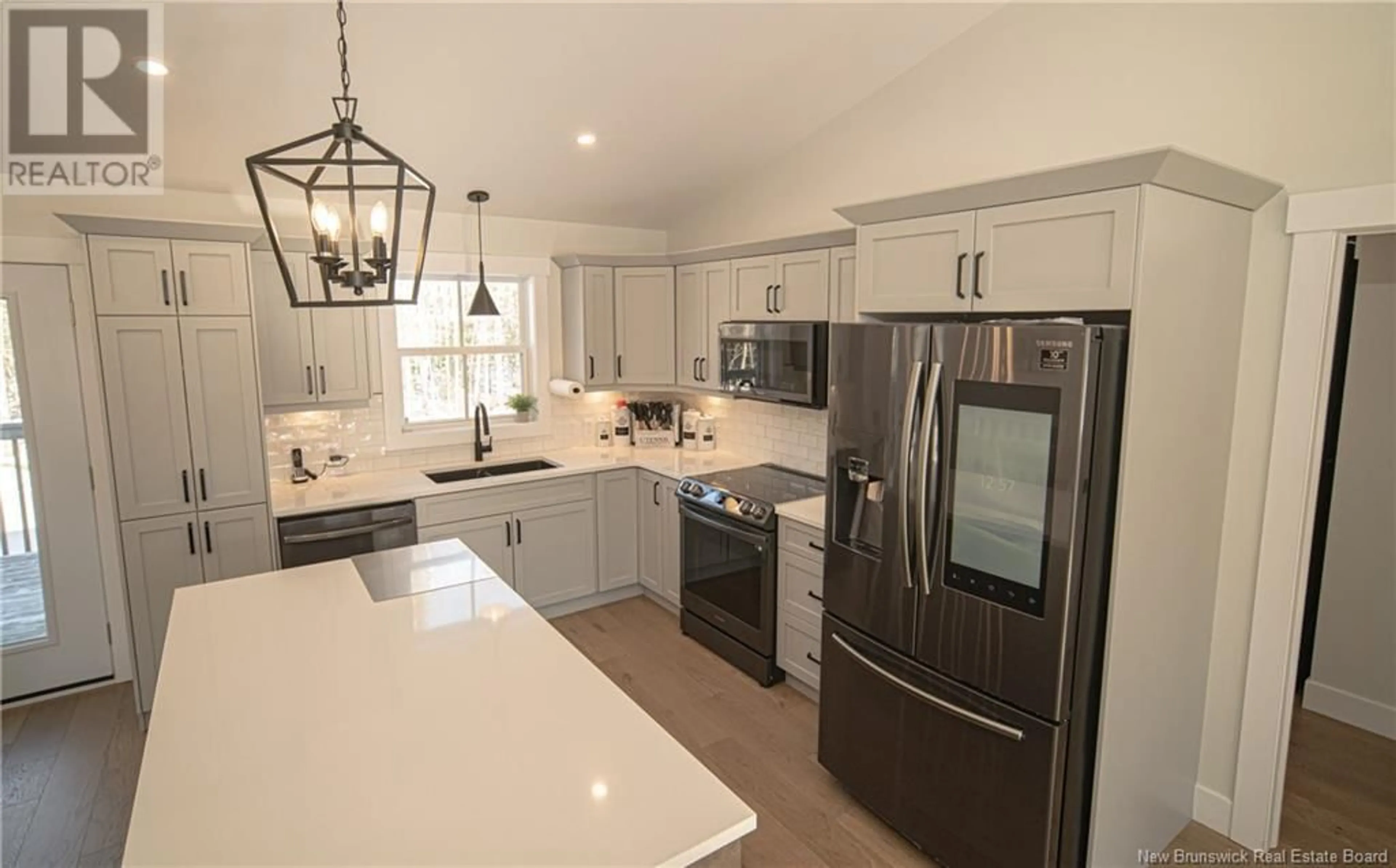 Open concept kitchen, ceramic/tile floor for 12 Barbara Drive, Rusagonis New Brunswick E3B0Y3