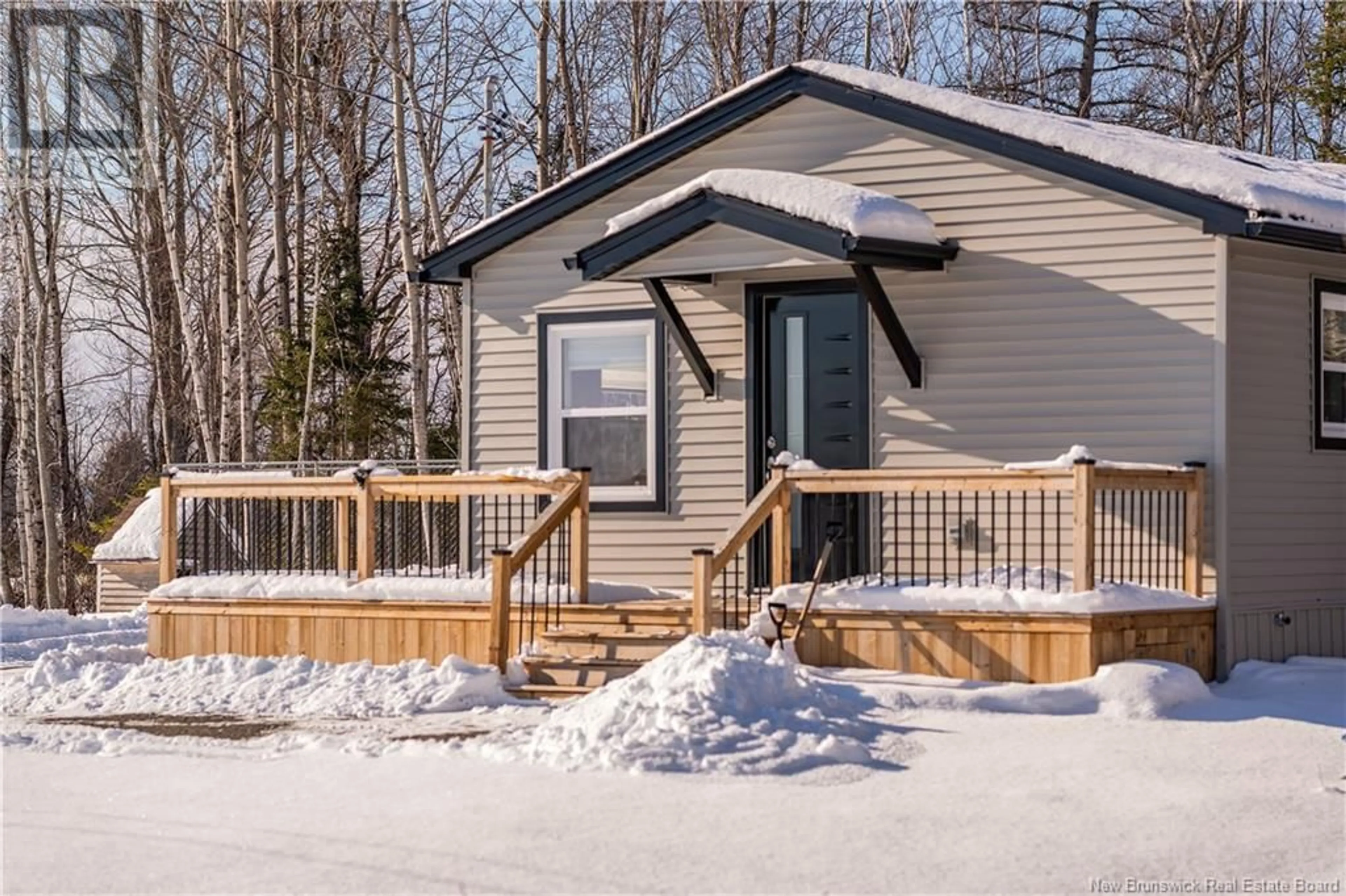 Home with vinyl exterior material, street for 19 Lecojo Lane, Cocagne New Brunswick E4R0G6