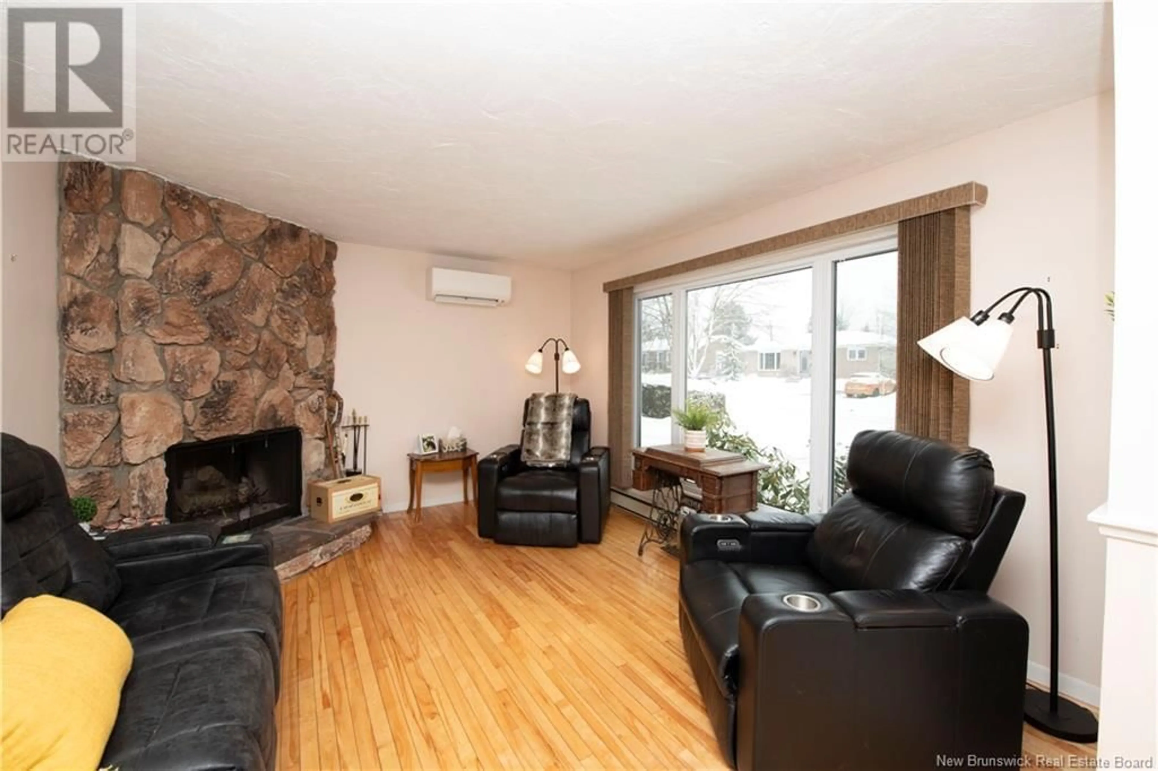 Living room with furniture, wood/laminate floor for 8 LaSalle Crescent, Moncton New Brunswick E1A5L6