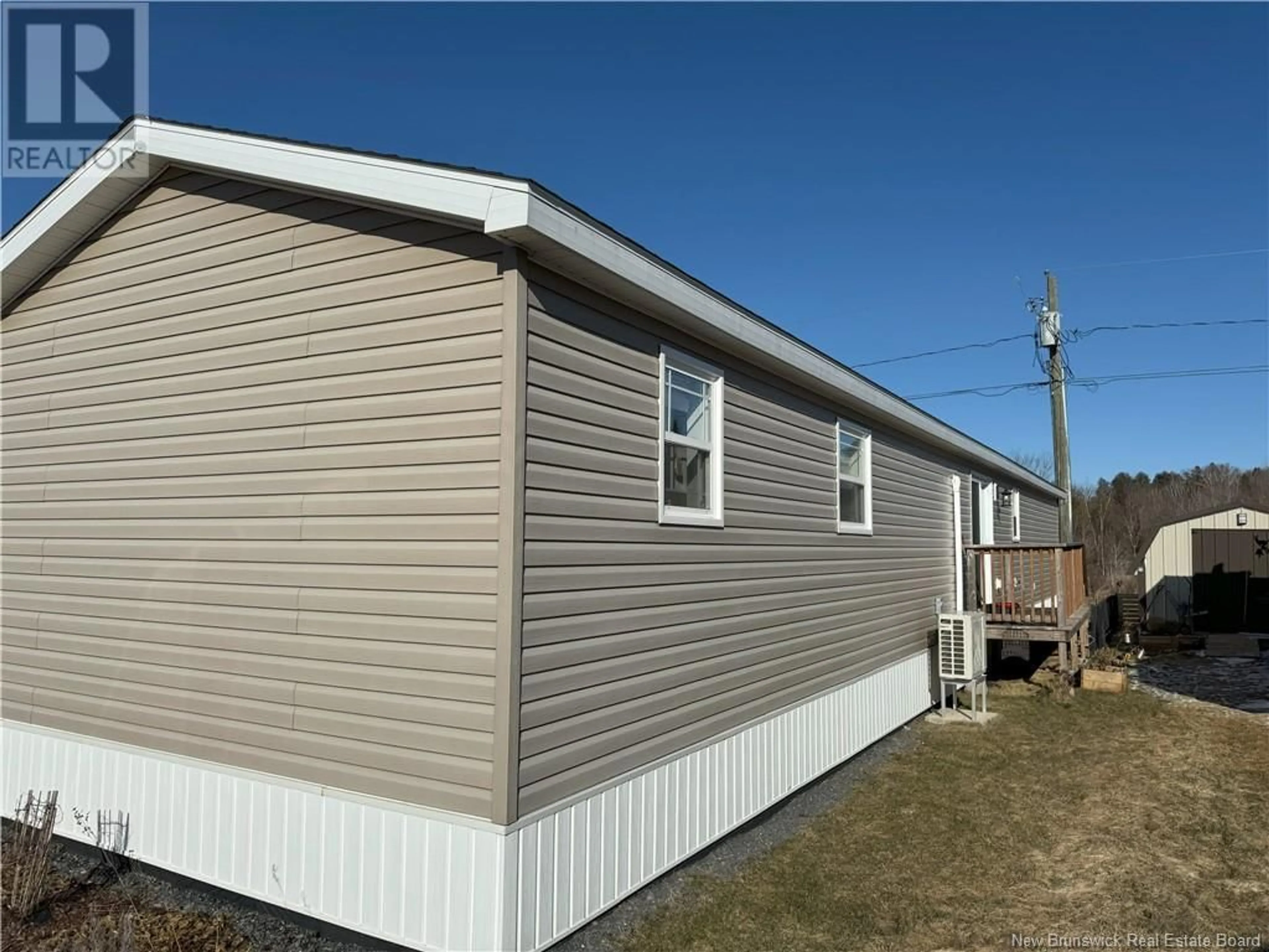 Home with vinyl exterior material, building for 43 Ivory Court, Woodstock New Brunswick E7M0G5