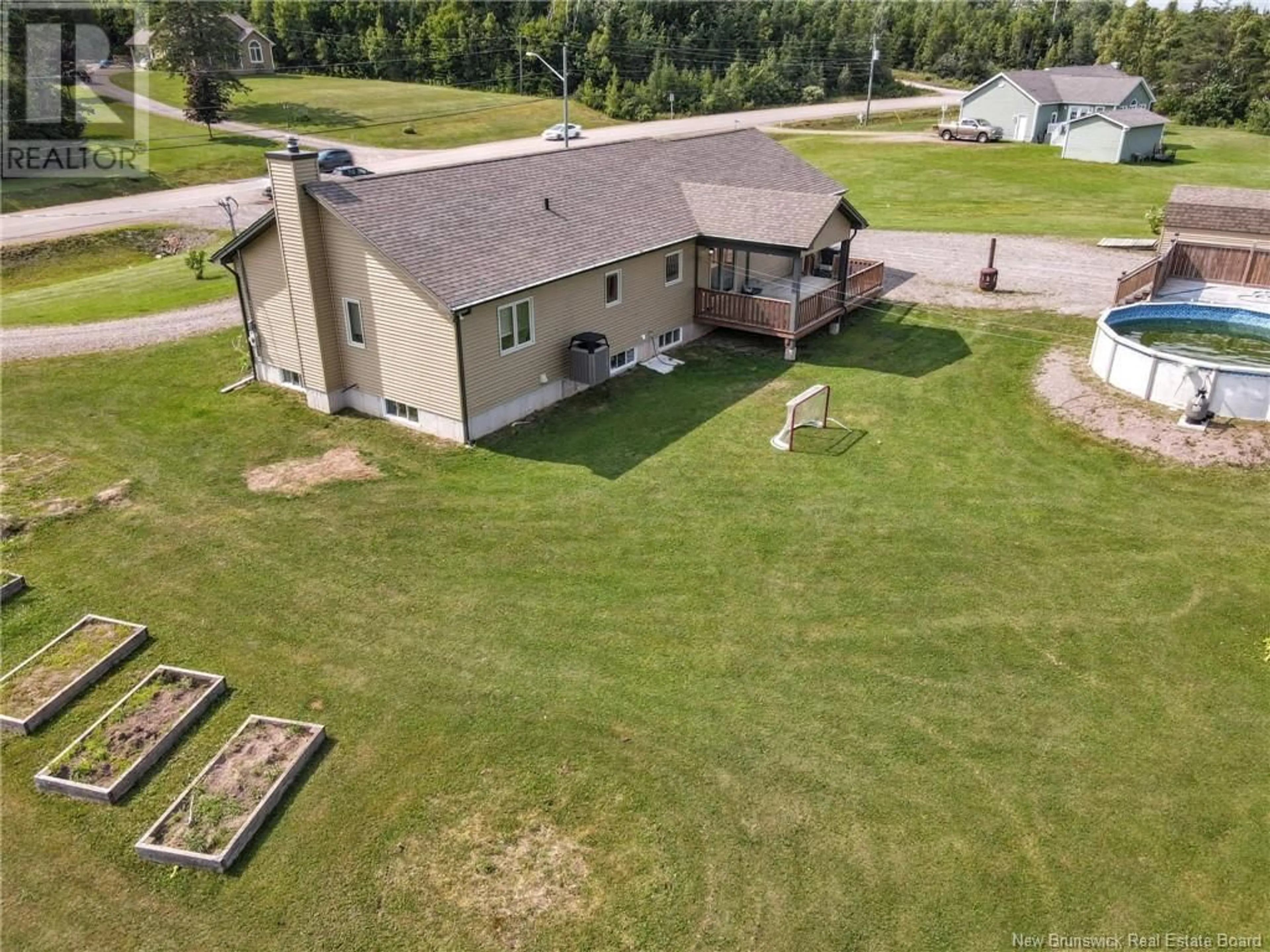 A pic from outside/outdoor area/front of a property/back of a property/a pic from drone, unknown for 692 Old Shediac Road, Memramcook New Brunswick E4K4A1