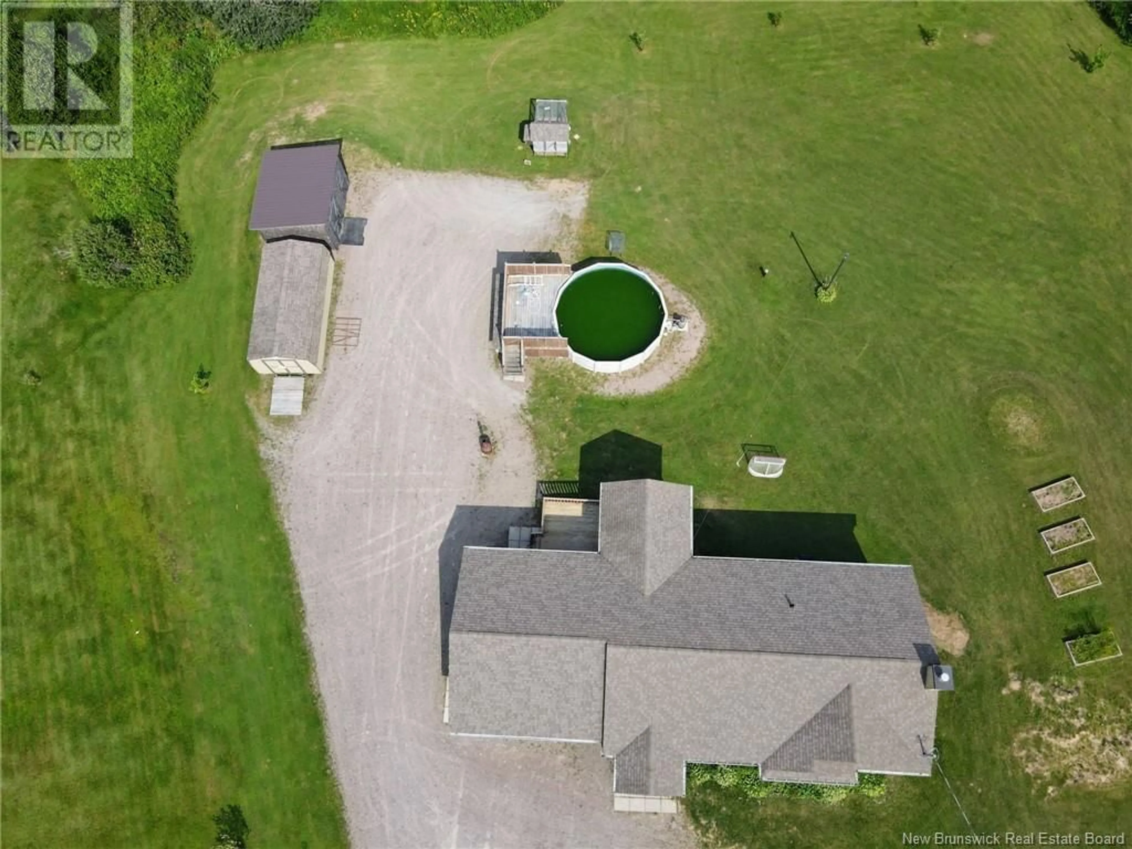 A pic from outside/outdoor area/front of a property/back of a property/a pic from drone, unknown for 692 Old Shediac Road, Memramcook New Brunswick E4K4A1