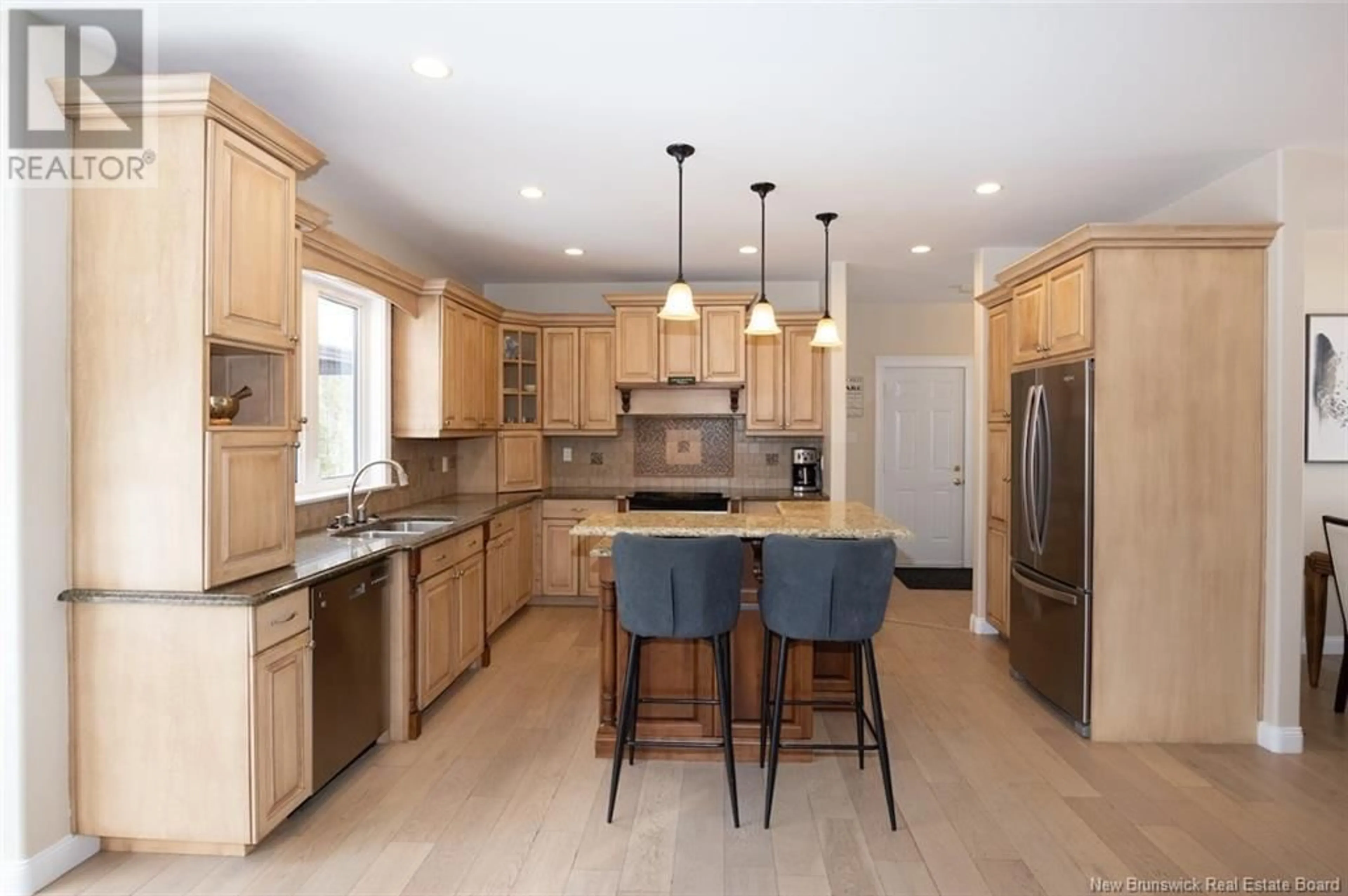 Open concept kitchen, ceramic/tile floor for 23 Academy Court, Fredericton New Brunswick E3C0C4