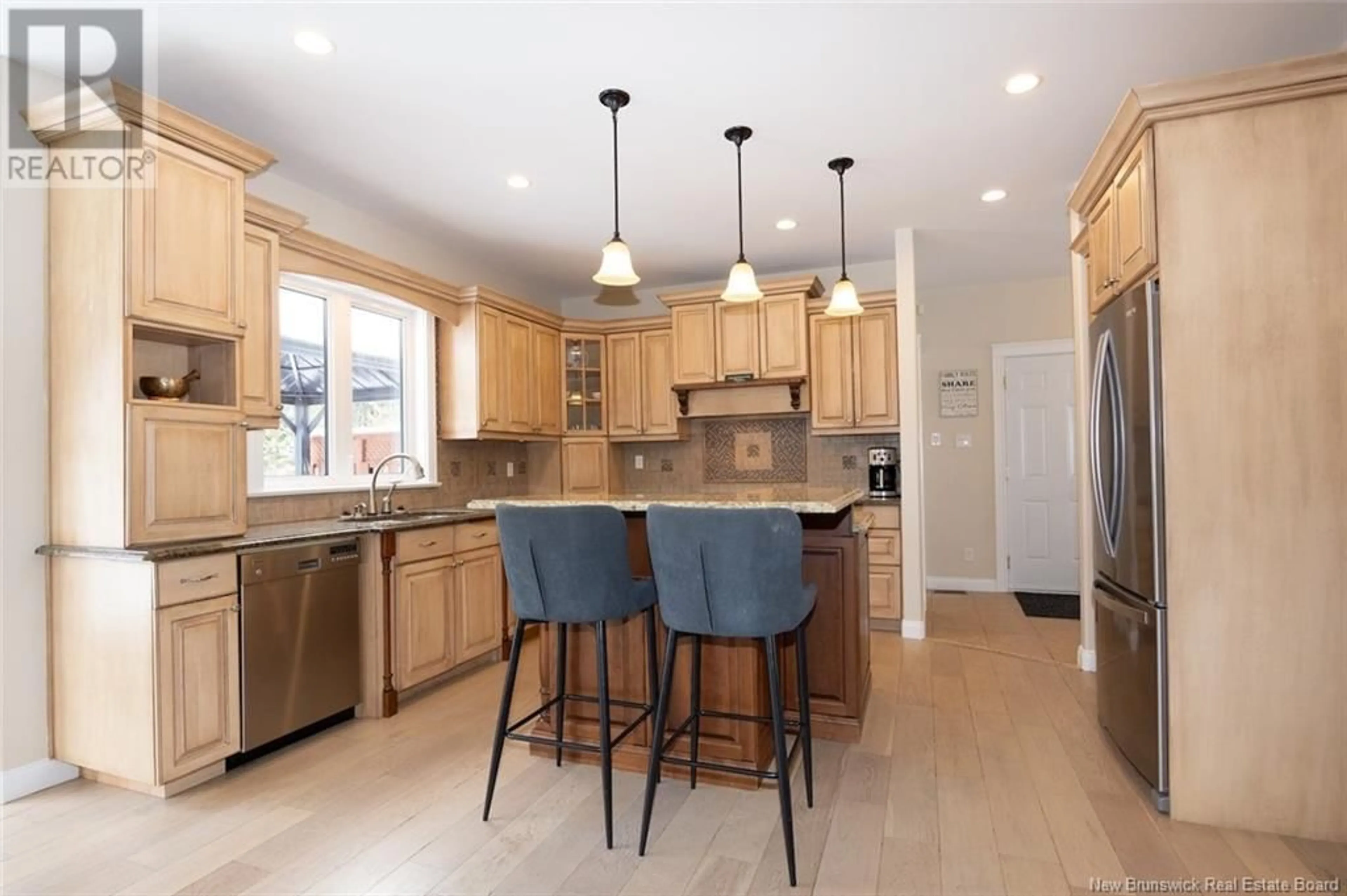 Open concept kitchen, ceramic/tile floor for 23 Academy Court, Fredericton New Brunswick E3C0C4